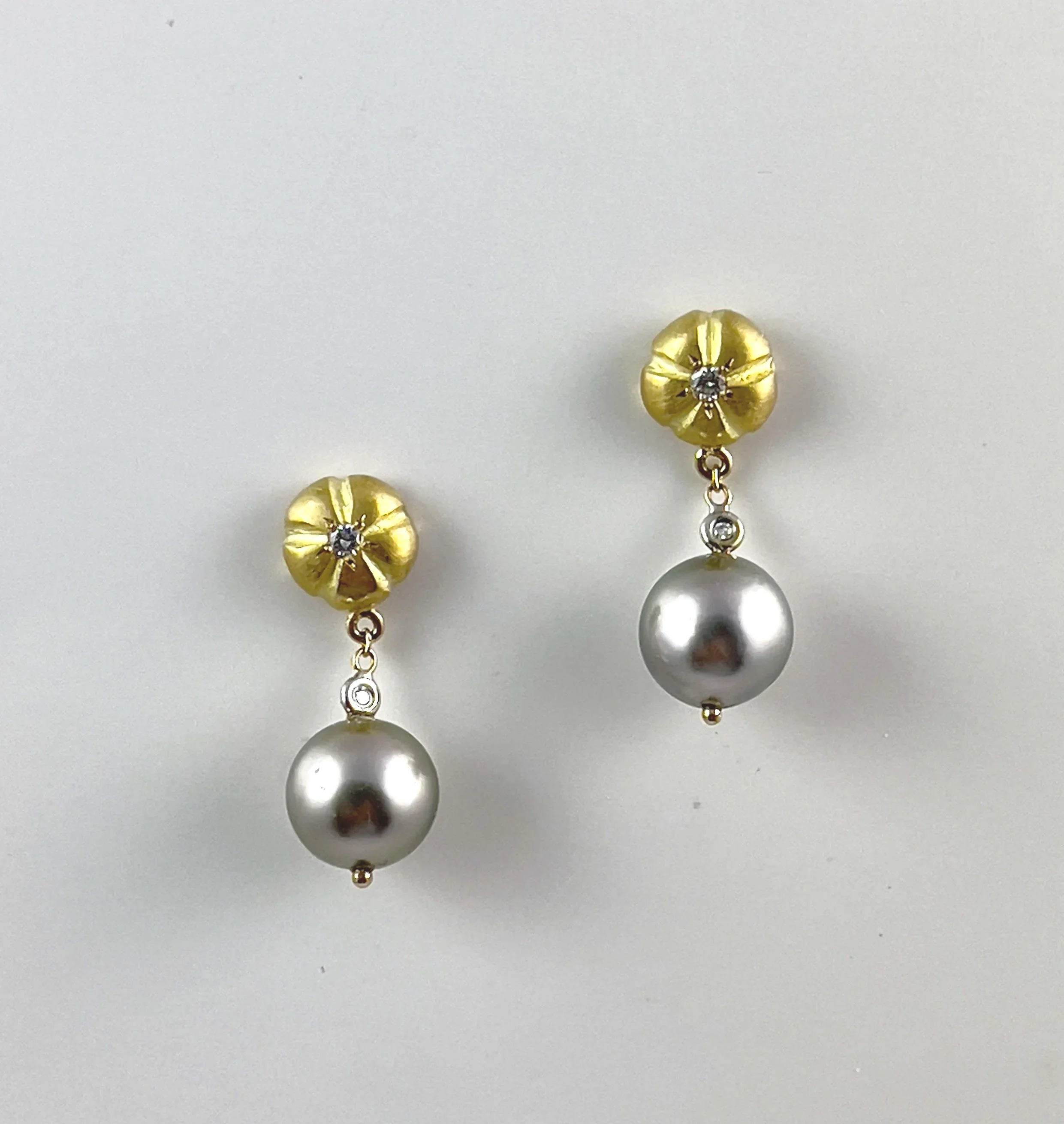 Teaser:  Florettes dangle silvery Tahitian pearls with tiny diamonds, total weight 0.12ct.