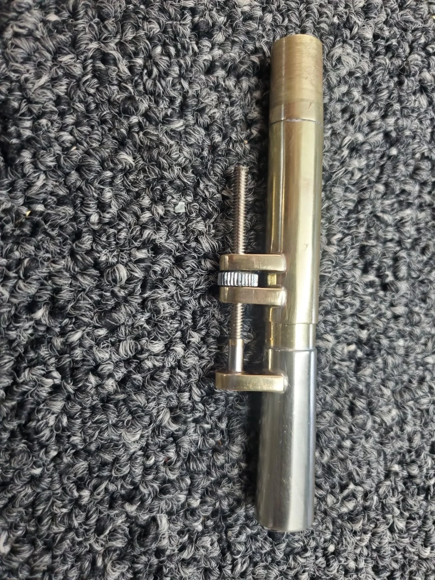 Here's a cute lil' tunable leadpipe I made for that cute lil' Eb cornet that tried to kill me a few weeks ago. The original removable leadpipe went missing in ages past. The owner provided pics of an original leadpipe from a similar instrument, and f
