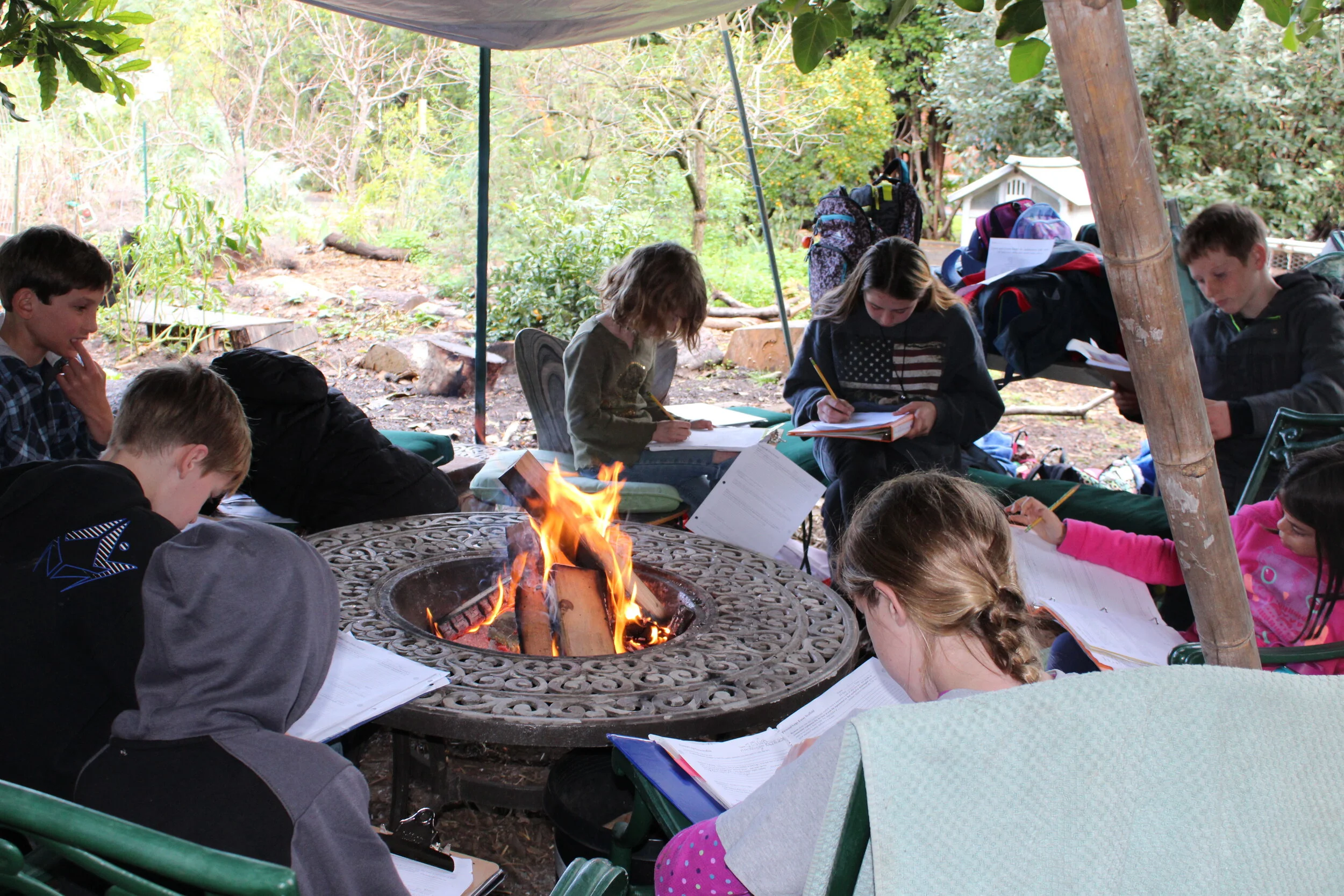 Essay writing in the student build rainy day shelter