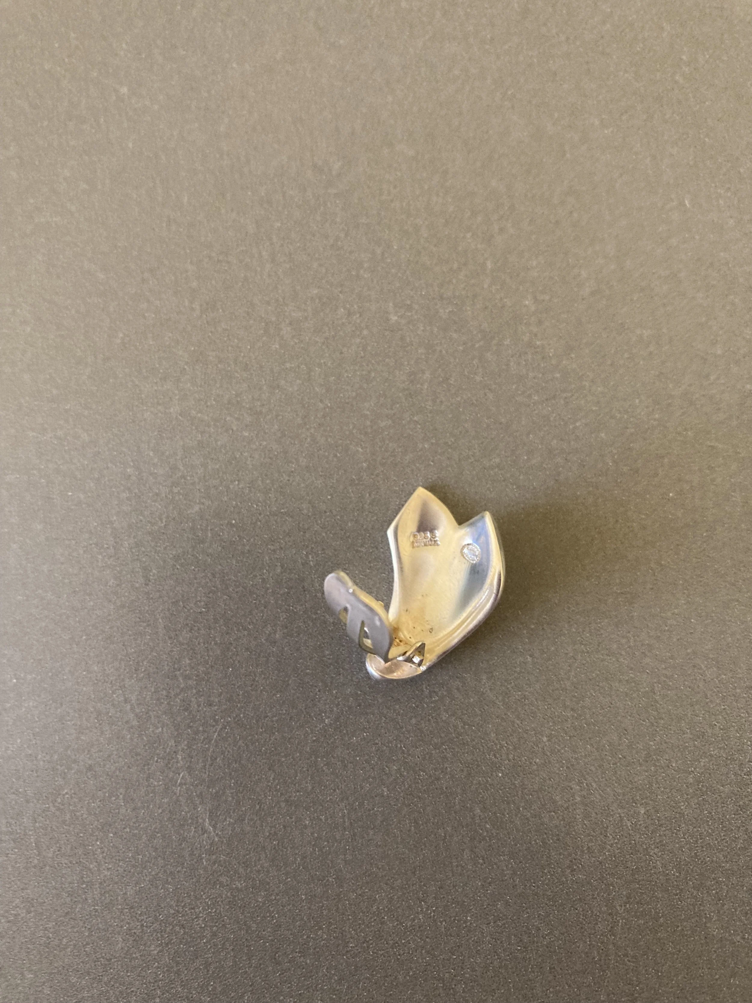 Lotus earclips 4.jpeg