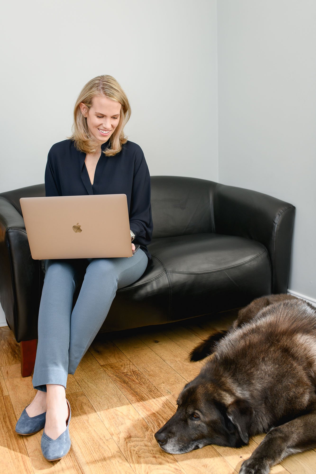 Lindsey Wells ND and her therapy dog at the office. Personal Branding photography session in Wilton CT by N. Lalor Photography.