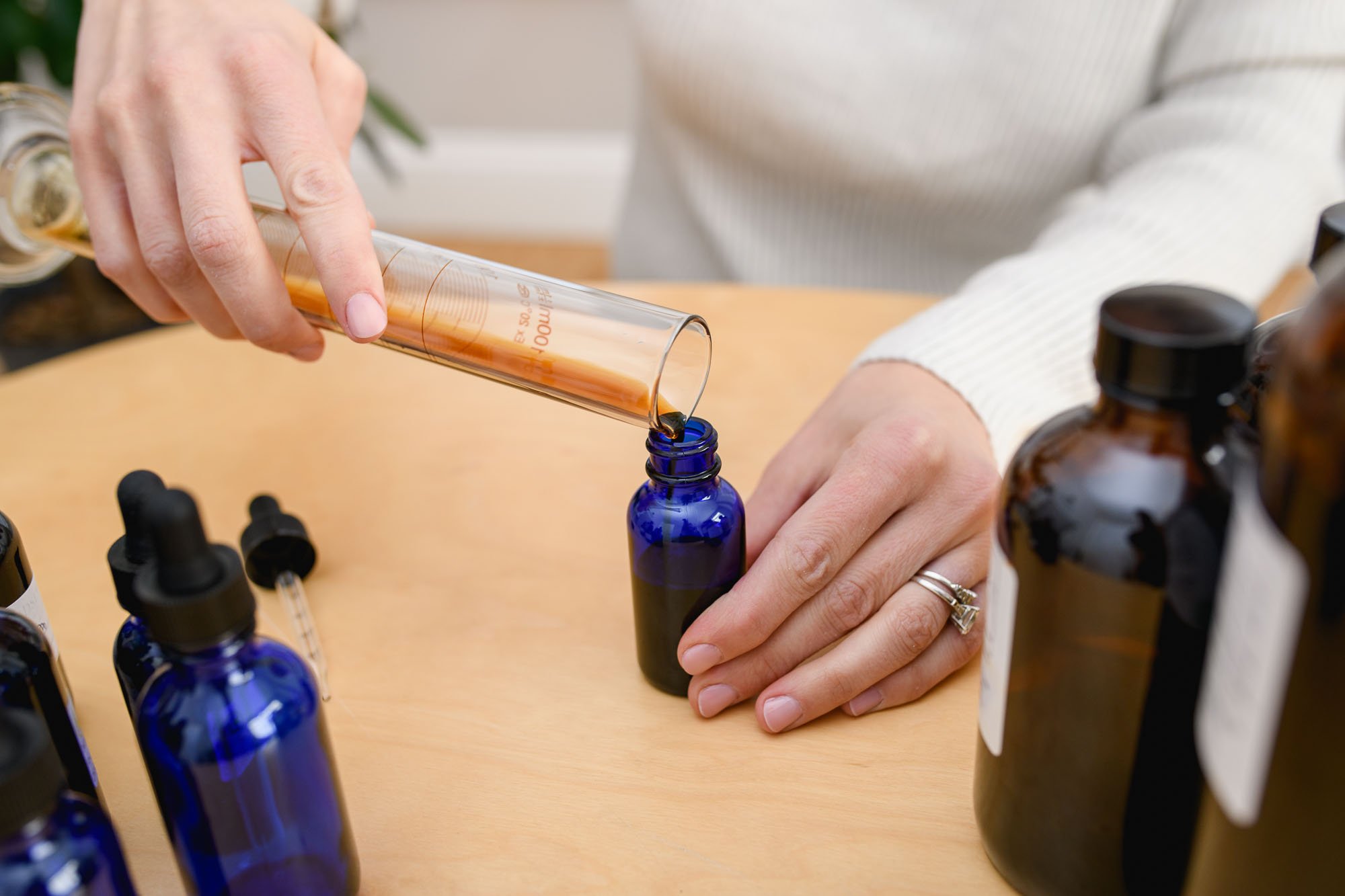 Botanical medicine close up of process. Personal Branding photography session in Wilton CT by N. Lalor Photography.