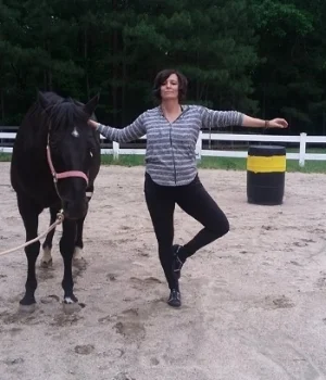 Me doing yoga with horses, courtesy of www.raleighncyoga.com 2017.&nbsp;