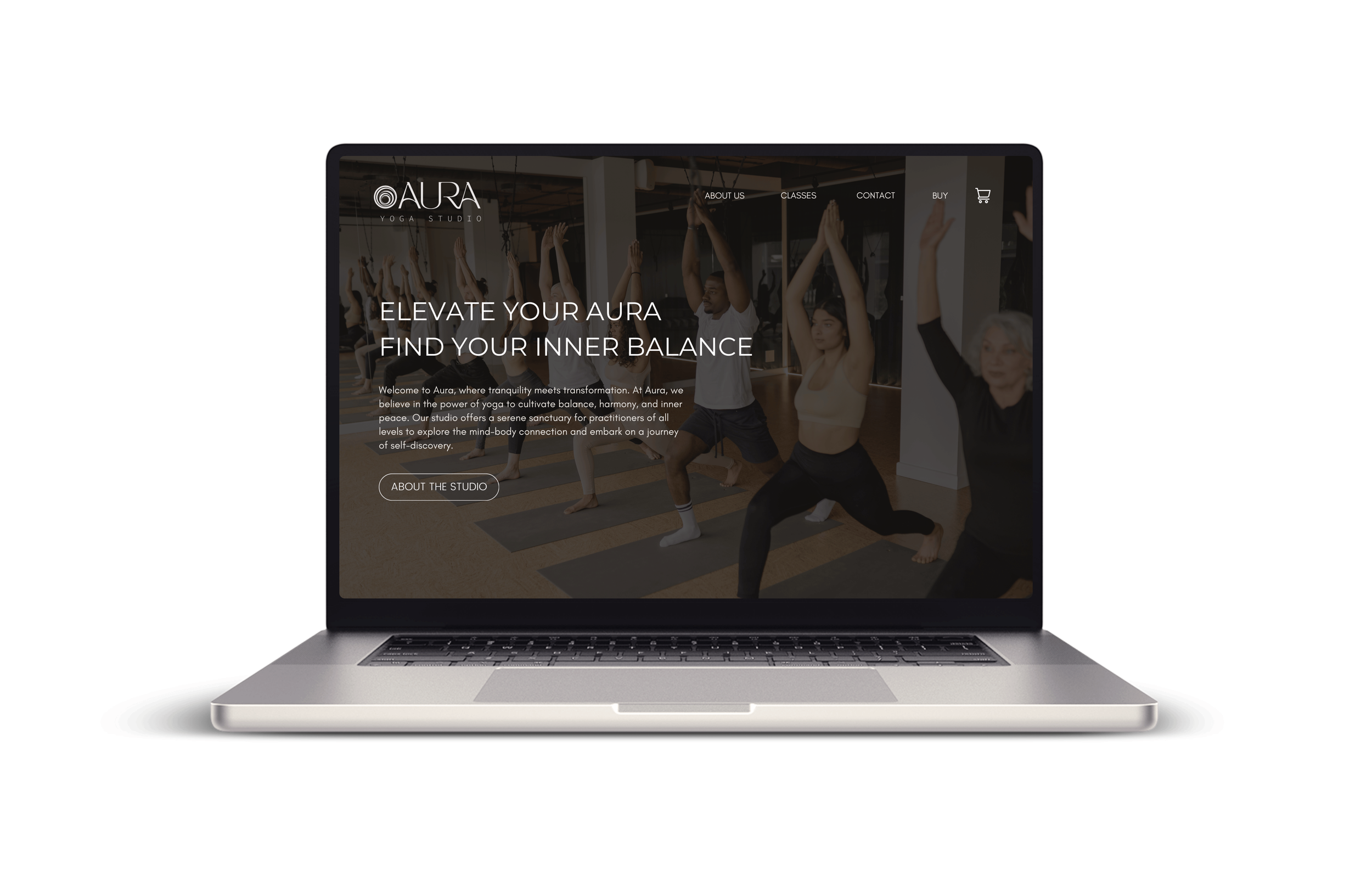 Laptop displaying Aura Yoga Studio website with yoga class image and menu options.