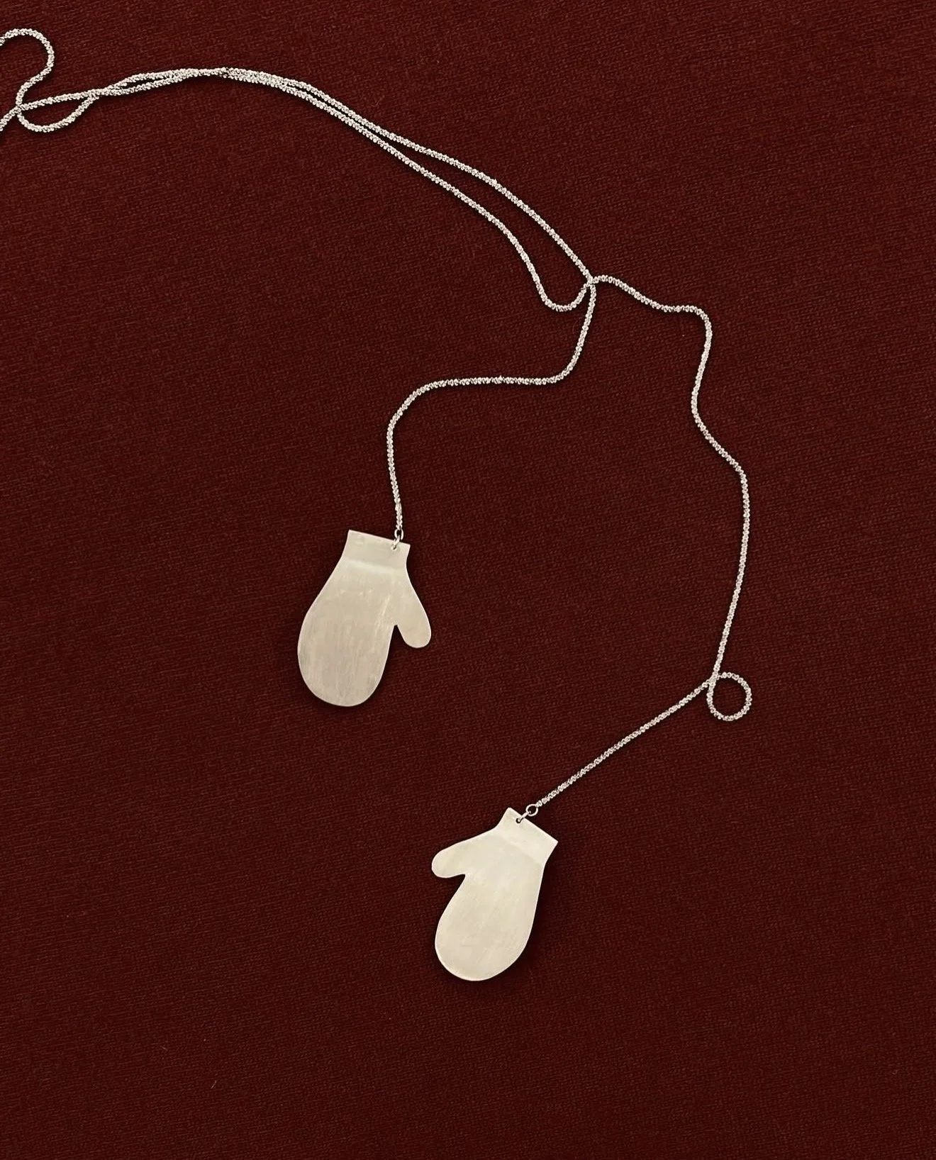silver glove necklace.jpg