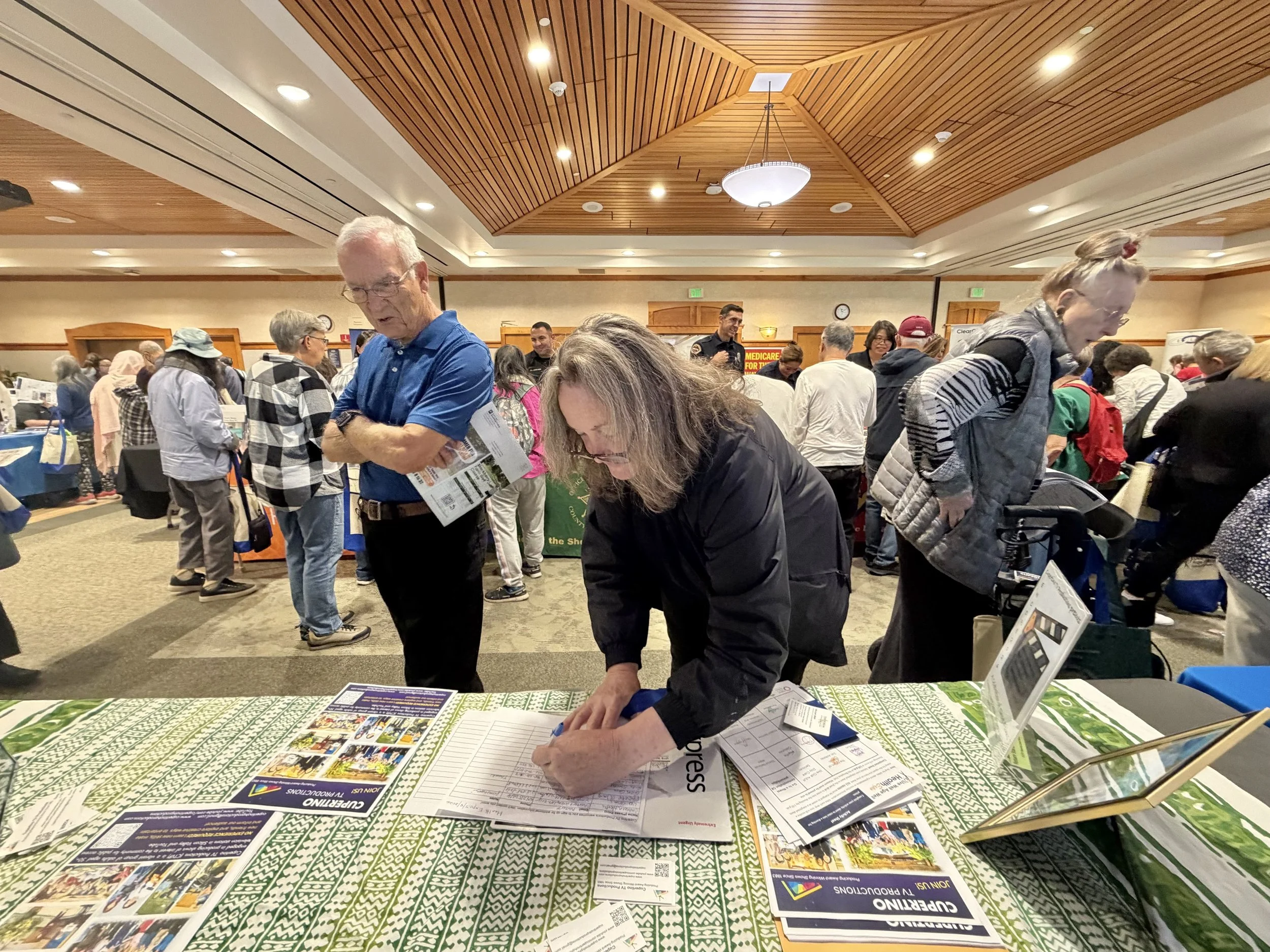 CSC Members signing Guest Info Sheet at CTVP Booth at Health Expo, 5/8/2026 