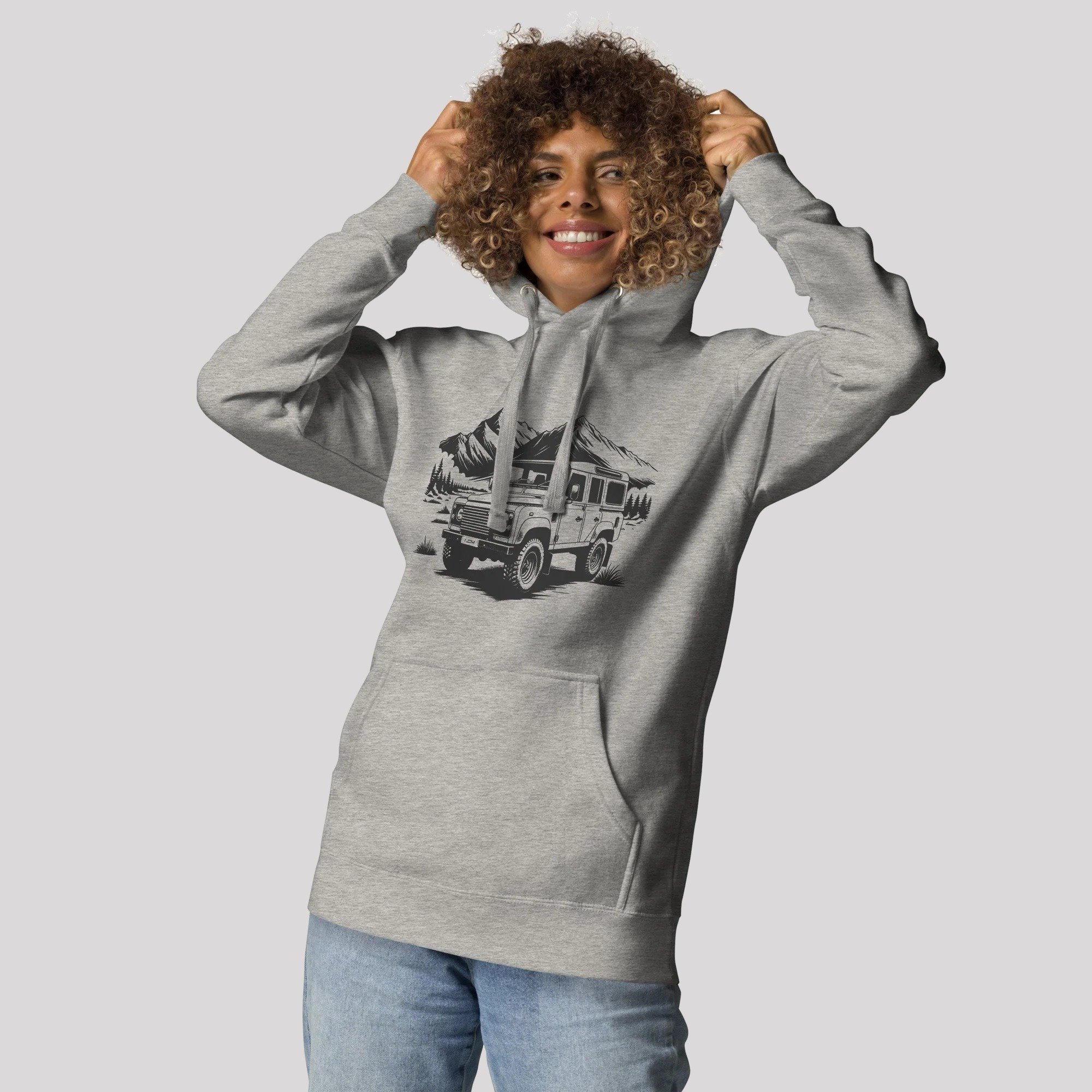 Land Rover Defender Mountains hoodie being worn – Carbon Grey