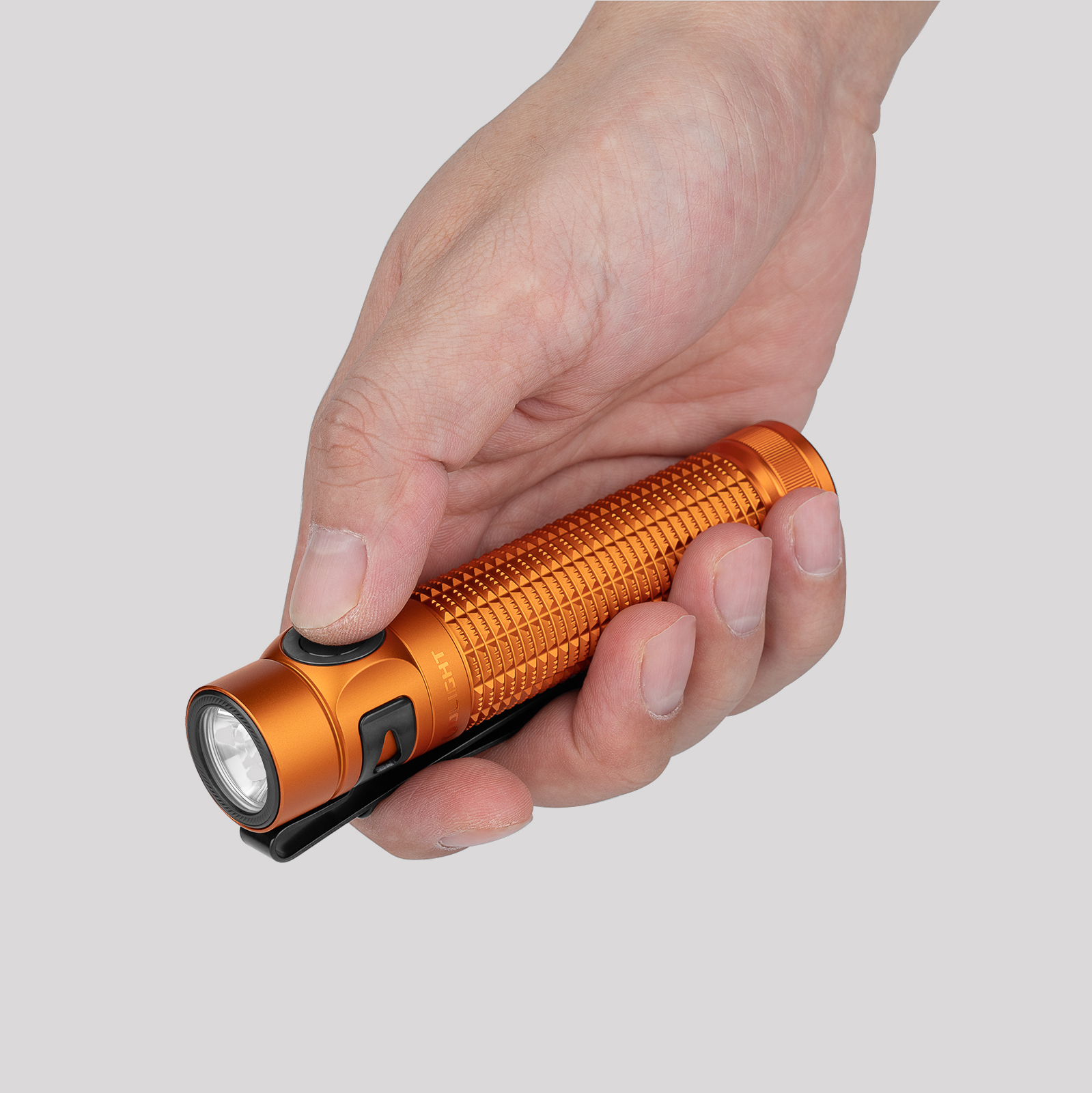baton-4-pro-orange-in-hand.png