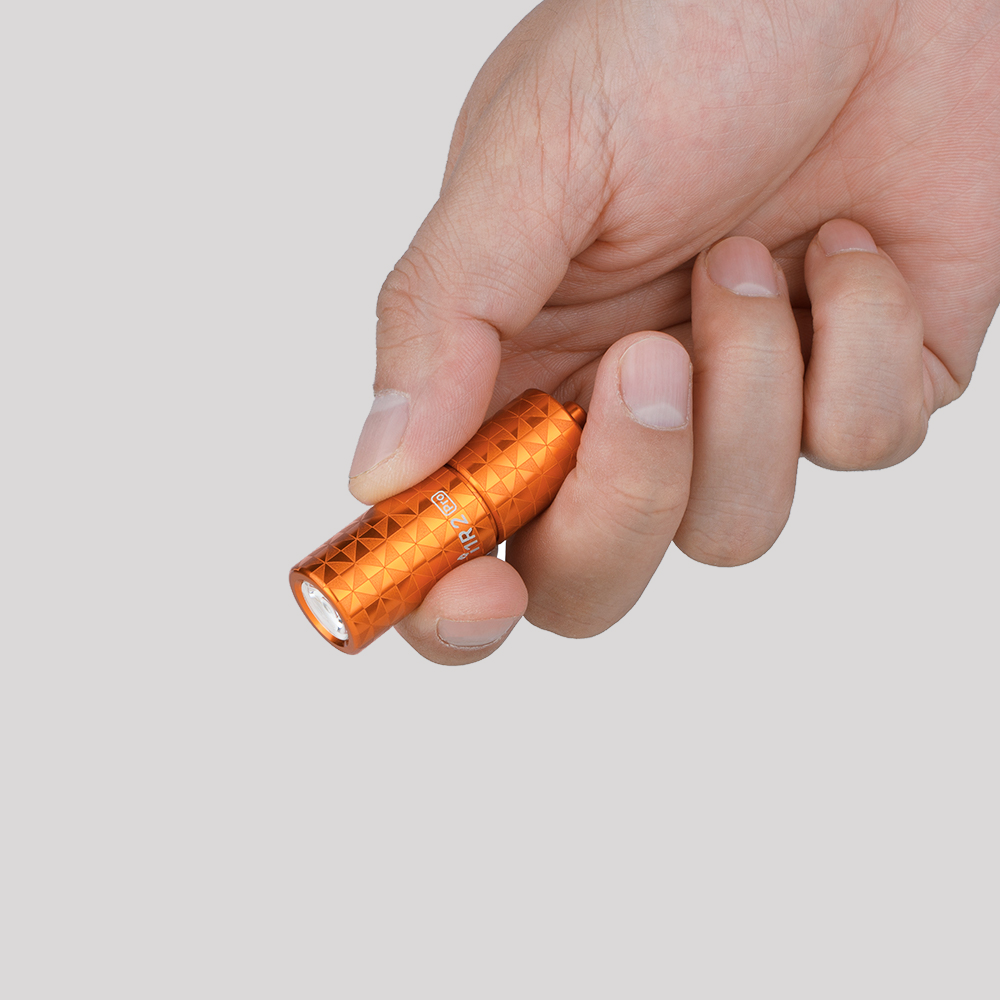 Olight i1R 2 Pro EOS Rechargeable Keychain Torch – in the hand