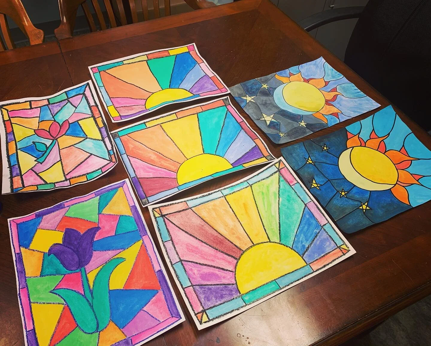 Happy Saturday, ZAMily!! Here&rsquo;s some of our finished pieces from the &ldquo;faux stained glass&rdquo; guided art lesson on yesterday&rsquo;s facebook live stream! We had so much fun with this one and we hope you do too. You can find this project and our past projects on the Zigler Art Museum youtube channel. 🎥 Swipe to see our instructor Mrs. Jessica accidentally cheese her arm for lunch! 😂🤪 #ZAMily #arttutorial #creamcheesearmtutorial
