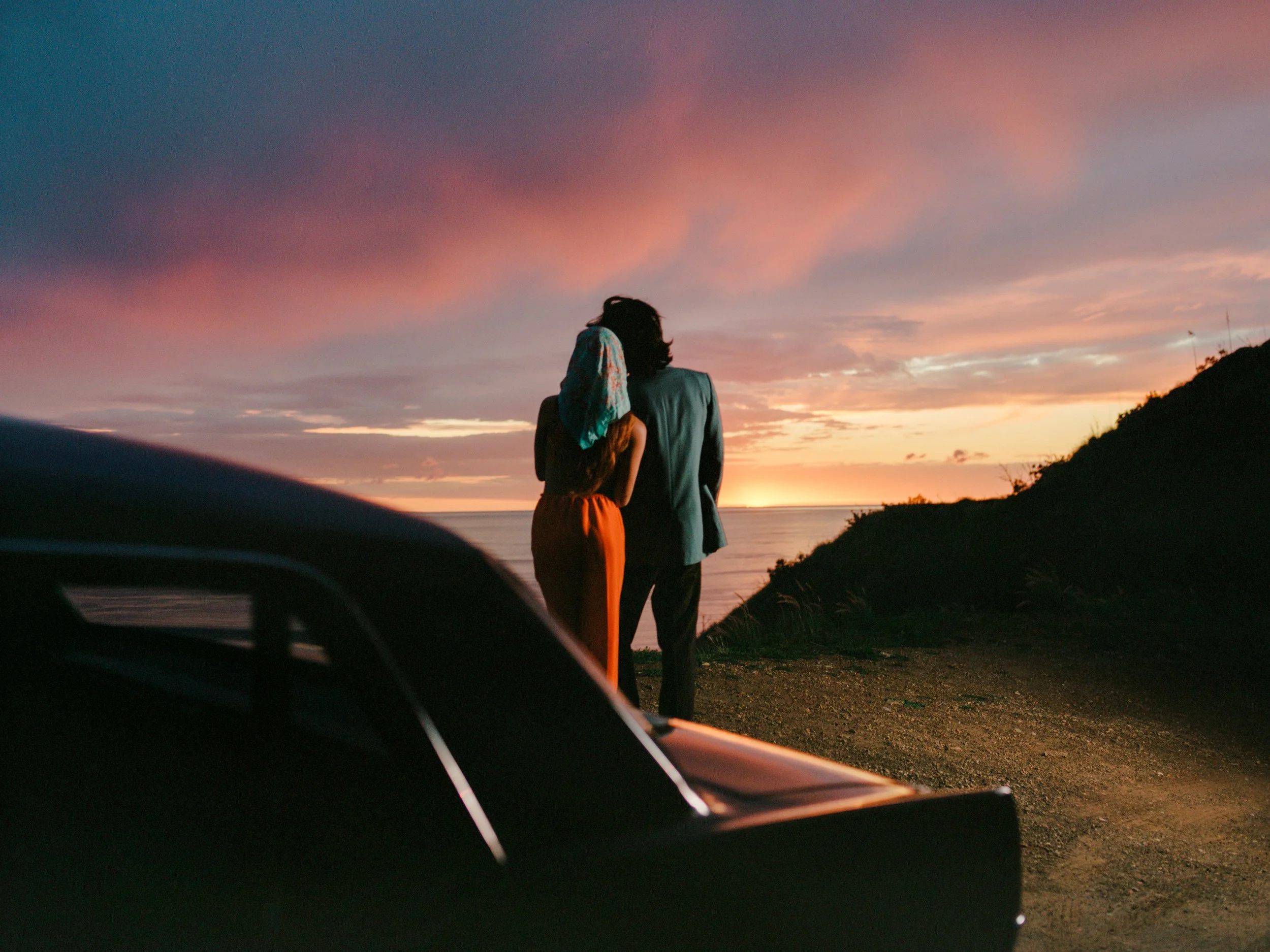 Enticed by depictions of the American Dream, many Koreans in the post-war era were inspired to move to the US, which advertised itself through pop culture, fashion, and sleek sports cars. Here, a young couple, newly immigrated to the United States, e