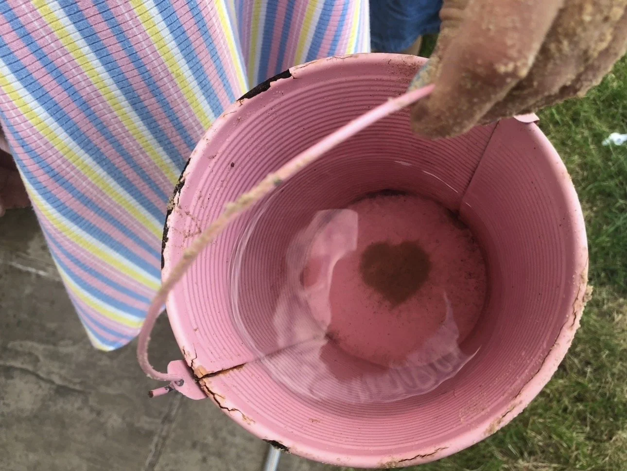 Love Remains, Always: God’s Message Through A Love Heart From Sand In Water
