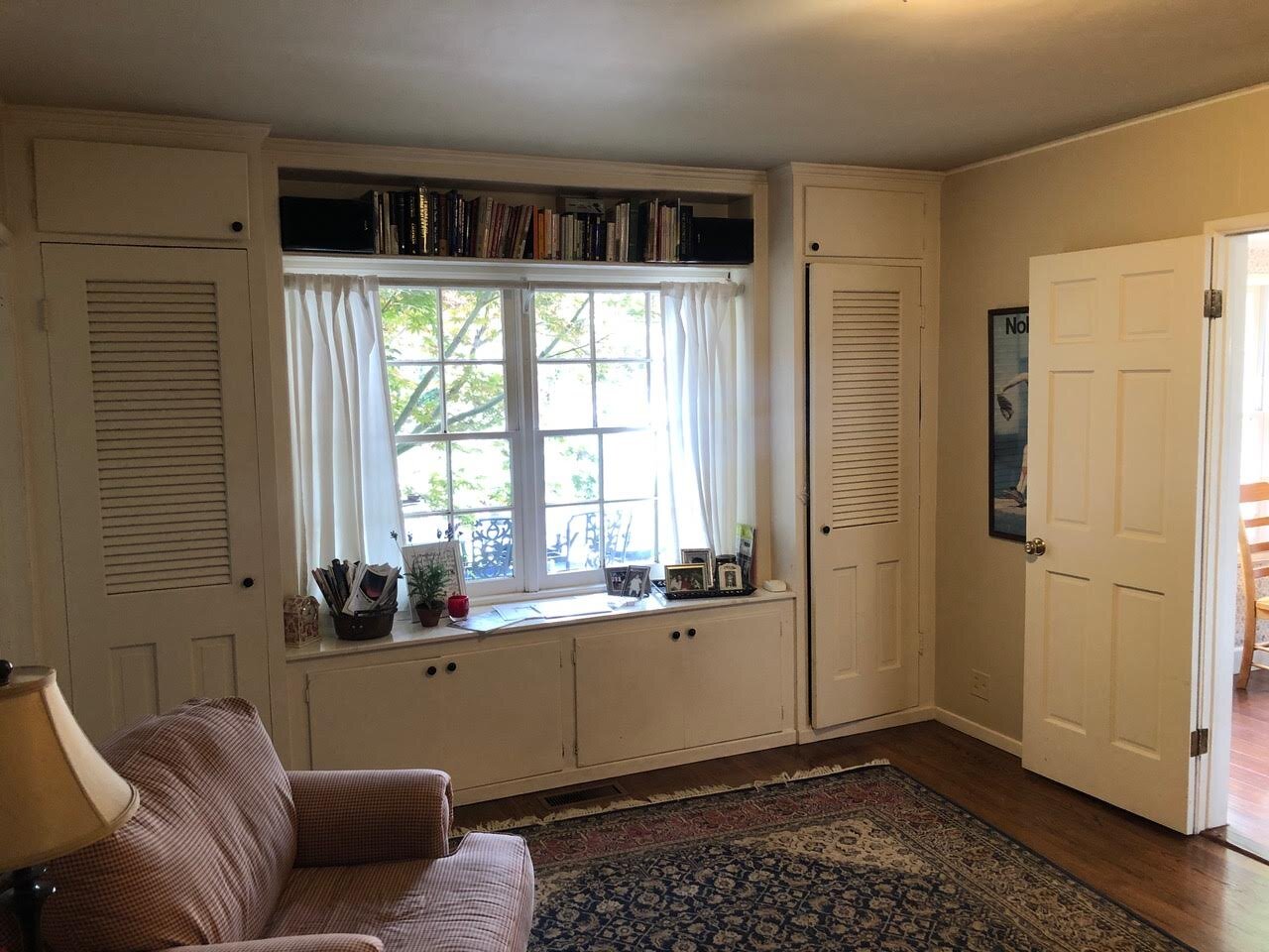 Before: The den, with the North-facing window. Kitchen is to the right.