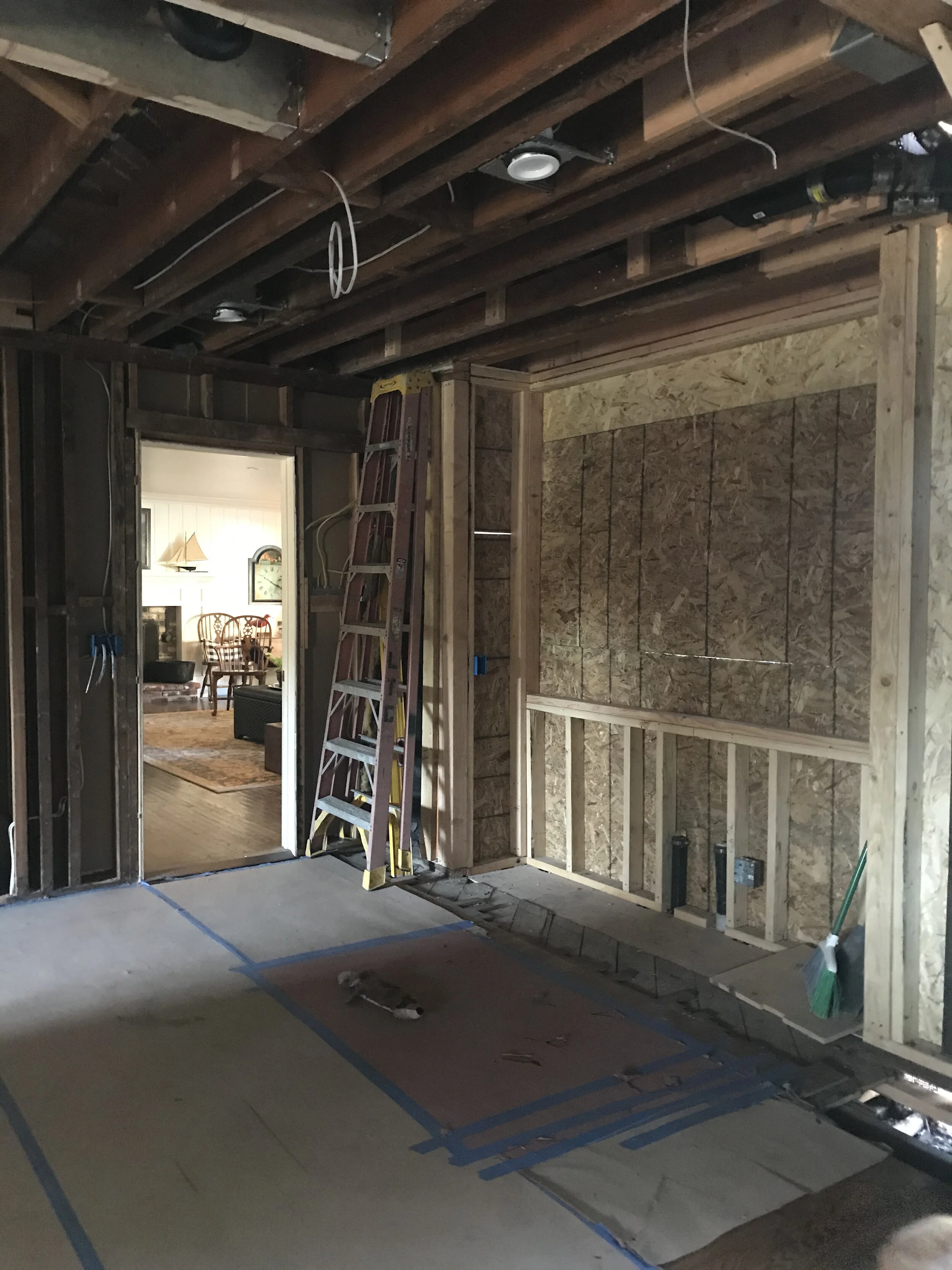 Construction: The den turning into the new main sink area. Pop out window going in.