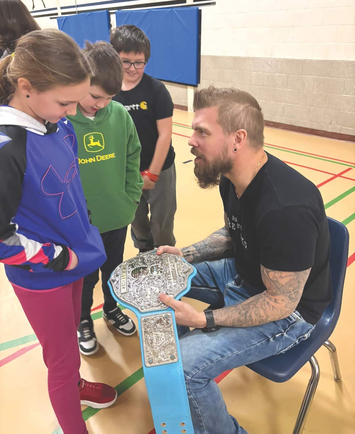 WWE wrestler inspires Westcliffe students to dream big
