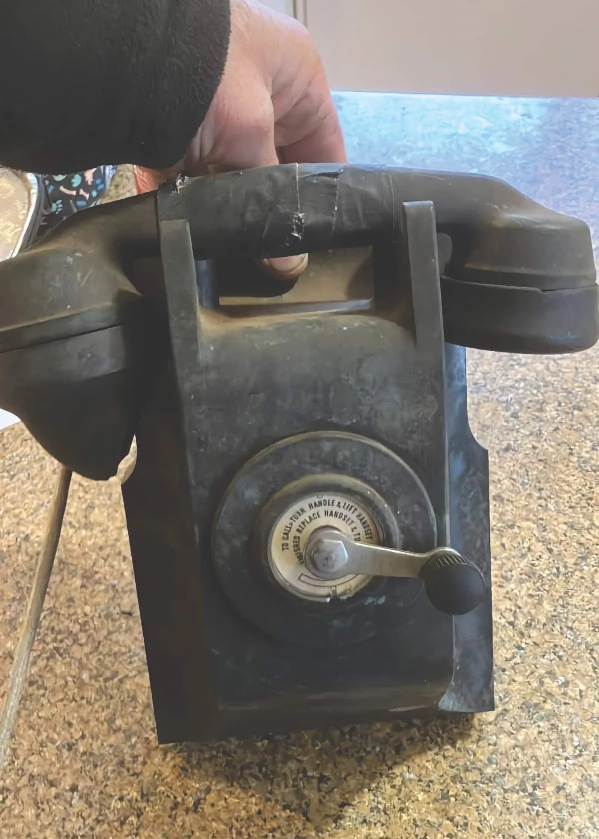 Vintage telephone came equipped with a crank