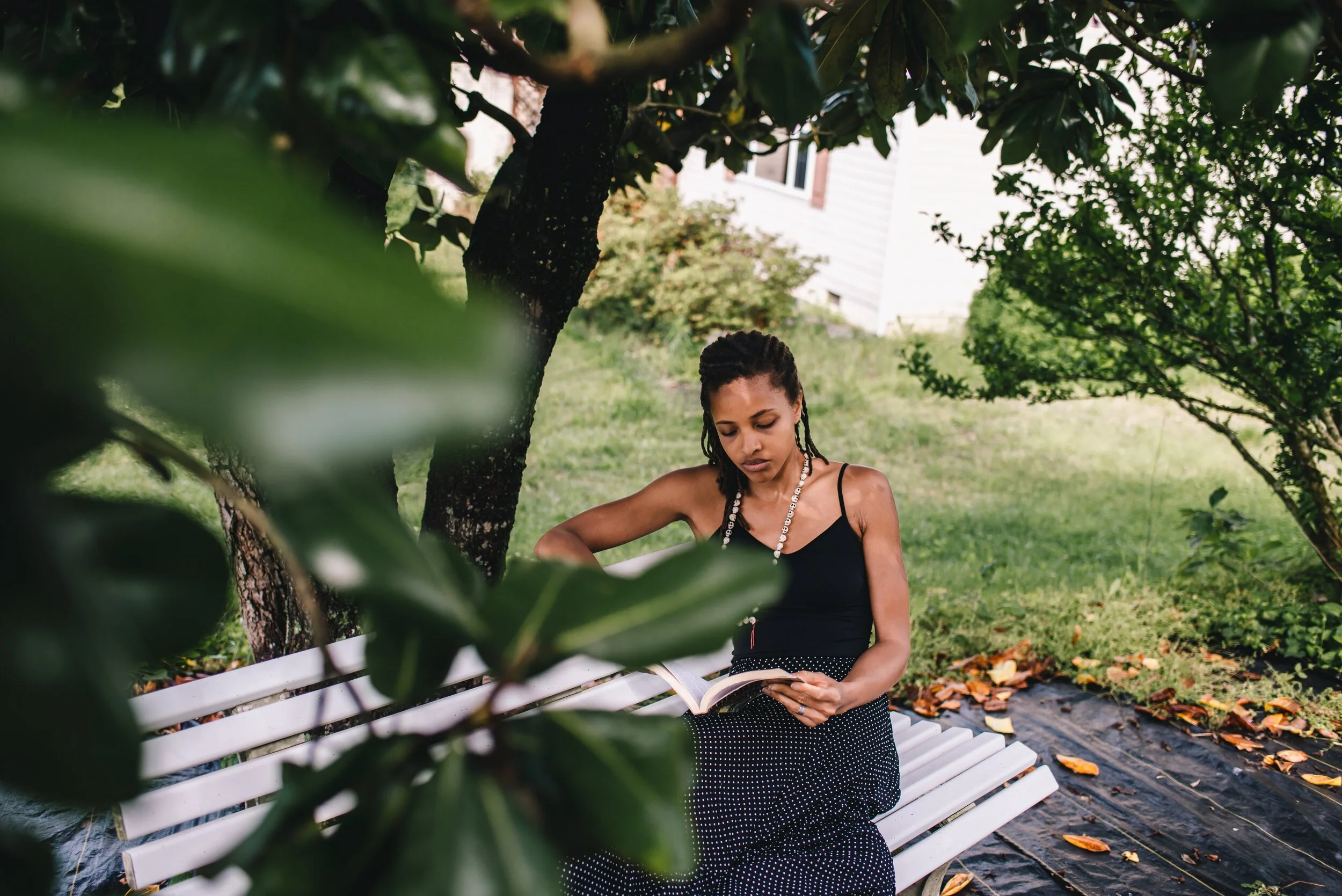 SYDNEY READING UNDER TREE.jpeg