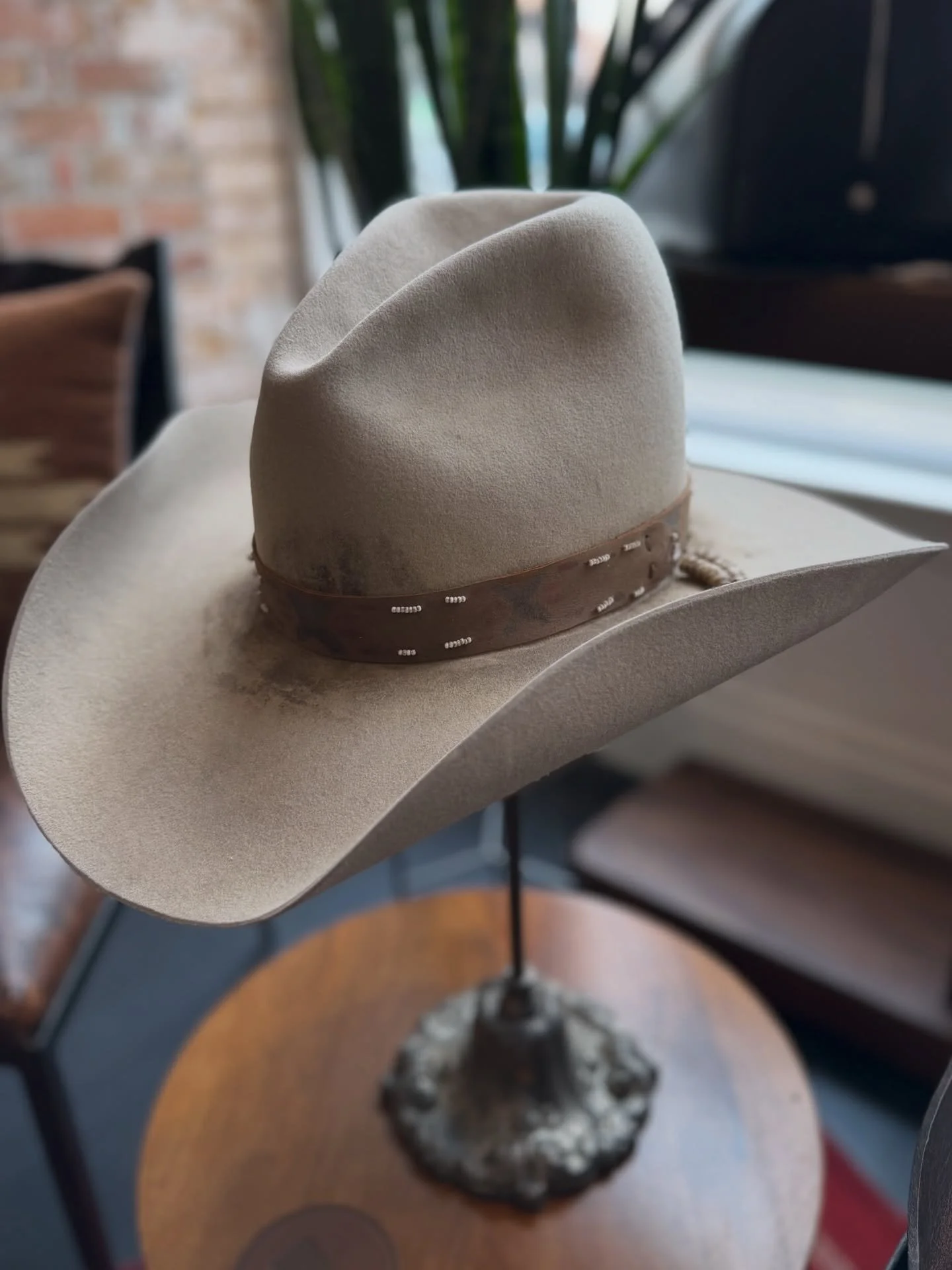 John&rsquo;s 6th D. James Hat. John comes down to Montana from Canada and loves iconic and recognizable hats. He&rsquo;s holding the 1883 James Dutton and the 1923 Spencer Dutton hat while wearing his Quigly. We took extra time to try to recreate the