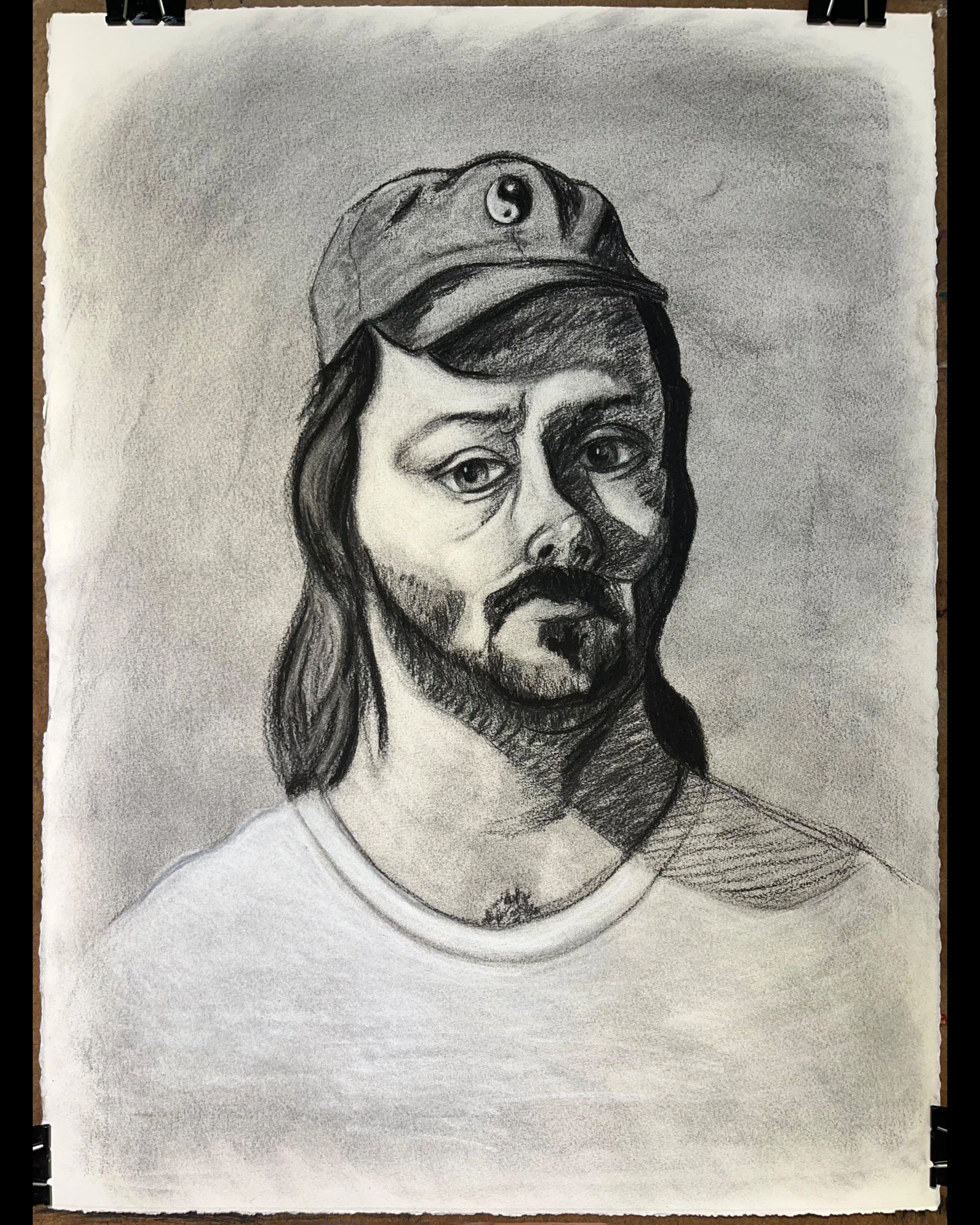 Self-Portrait At 27, 2025. Charcoal on Arches watercolor paper. 22x30"