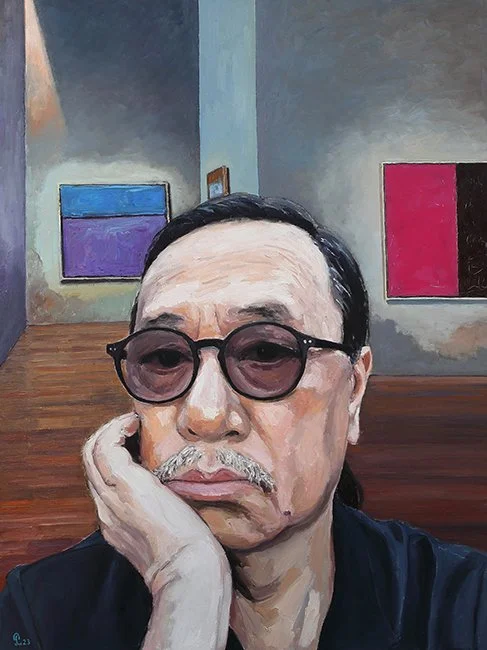 Selfie Portrait of Artist Pham Luan in an art gallery