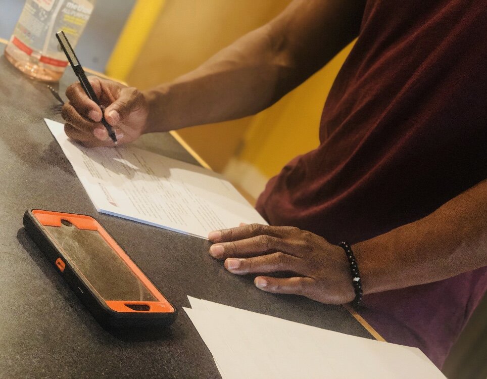Client filling out a customized online training program assessment