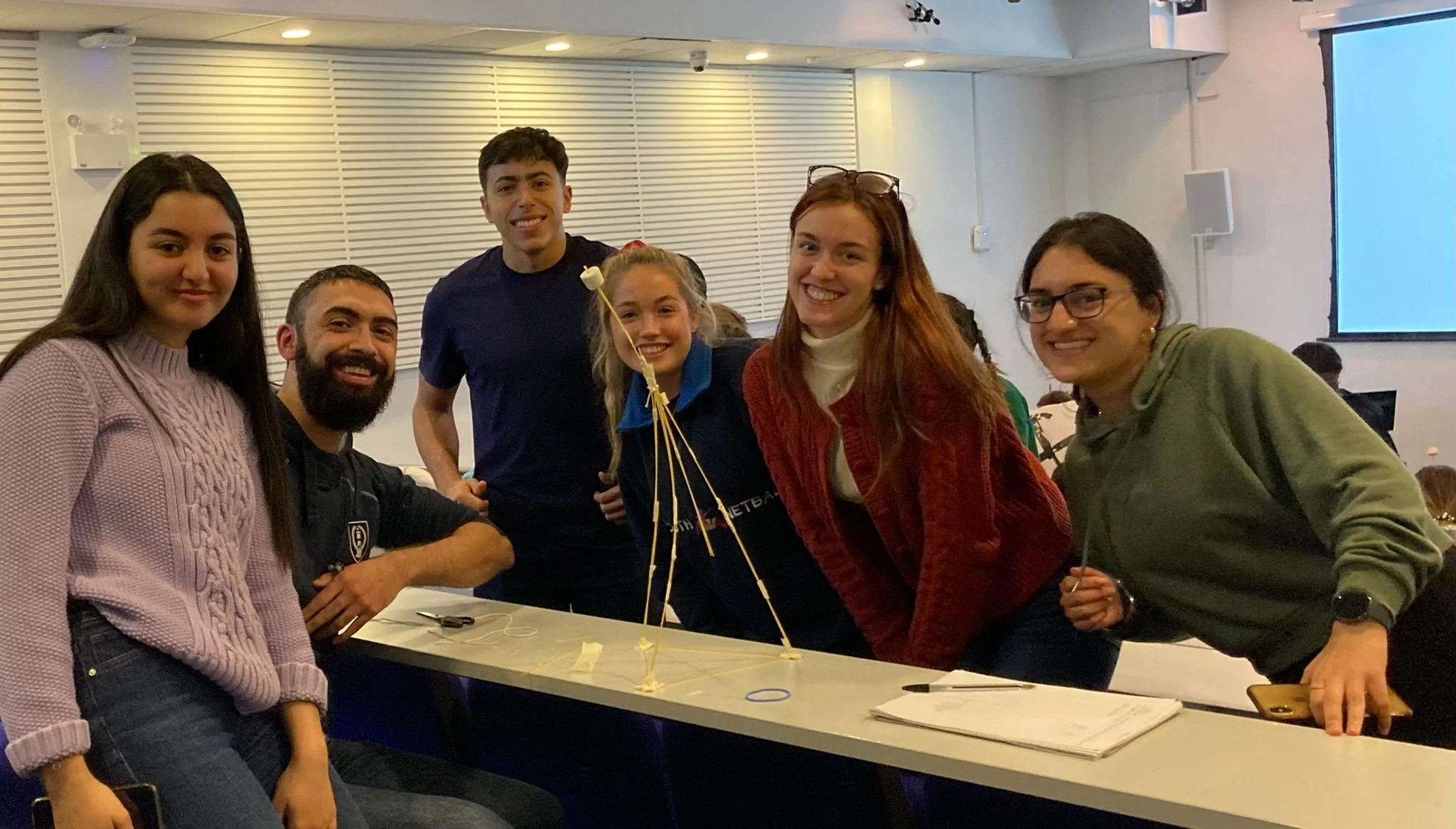 Group of students smiling.