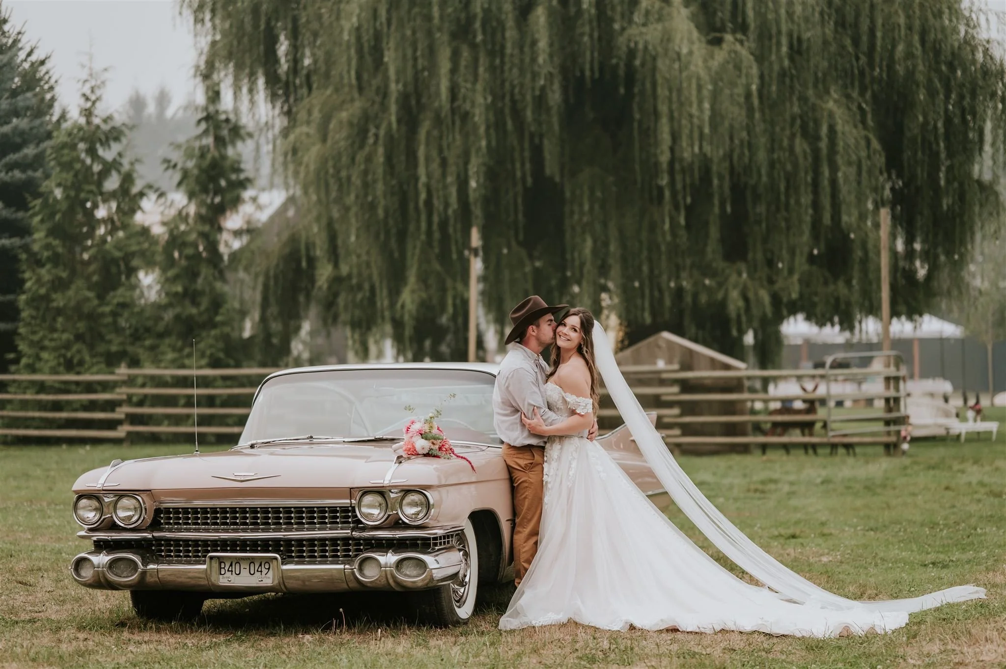 Bride and Groom with old car in the Pemberton Meadows
