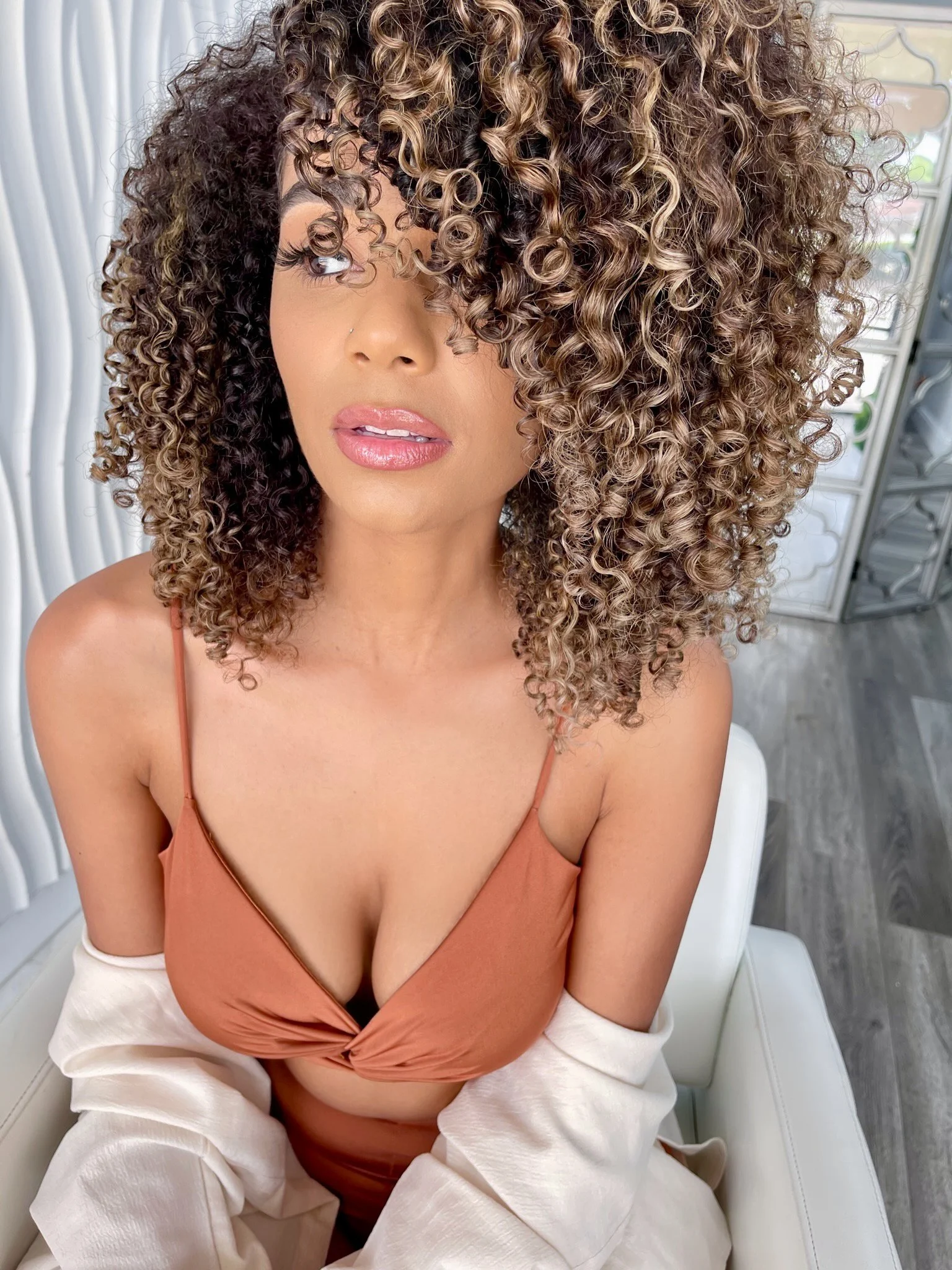 Salon PK's comprehensive guide to embracing natural curls, featuring tips for maintaining healthy, textured hair. Jacksonville Florida Hair Salon