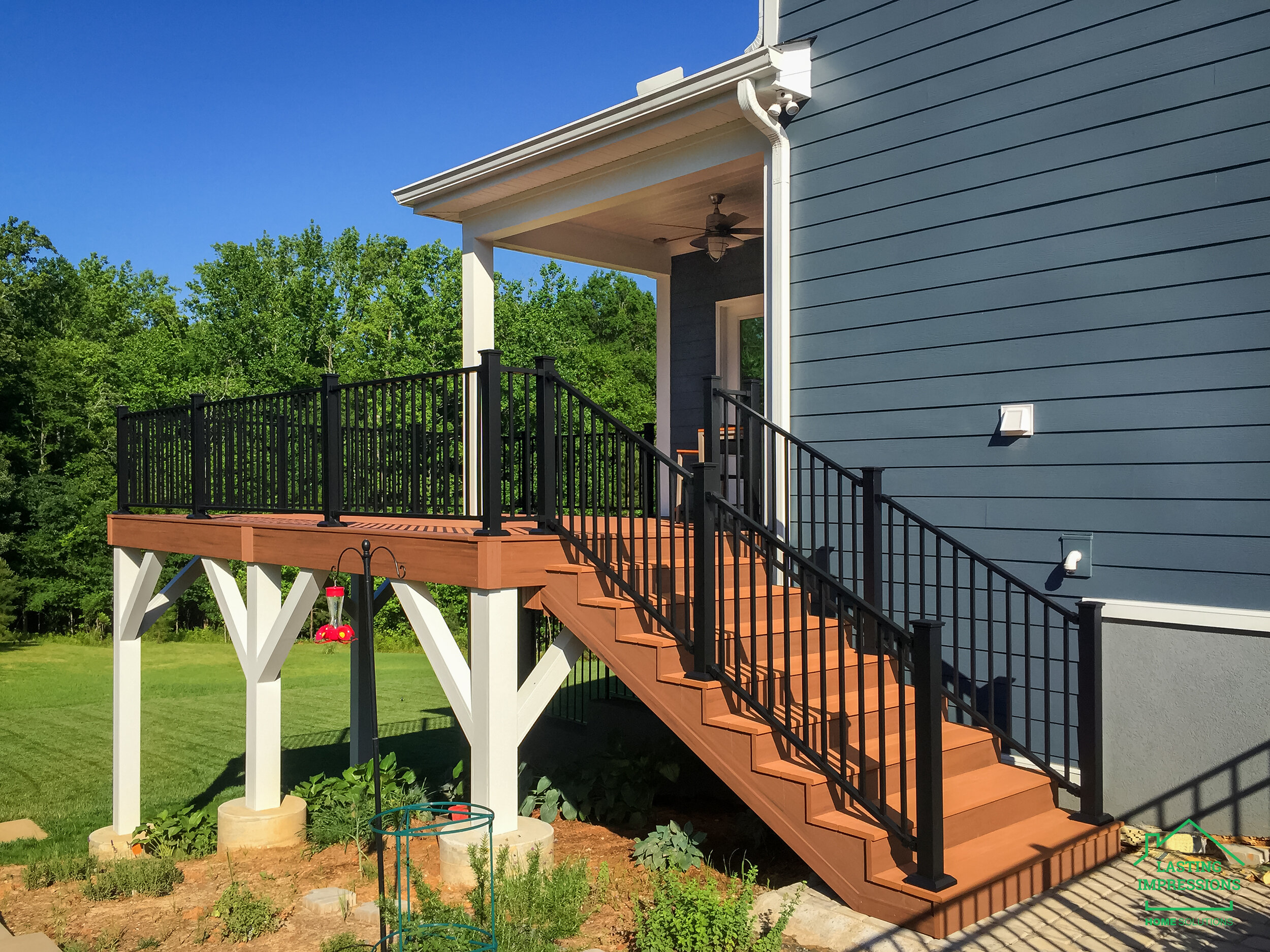 James Hardie Siding and Deck Extension — Lasting Impressions Home Solutions