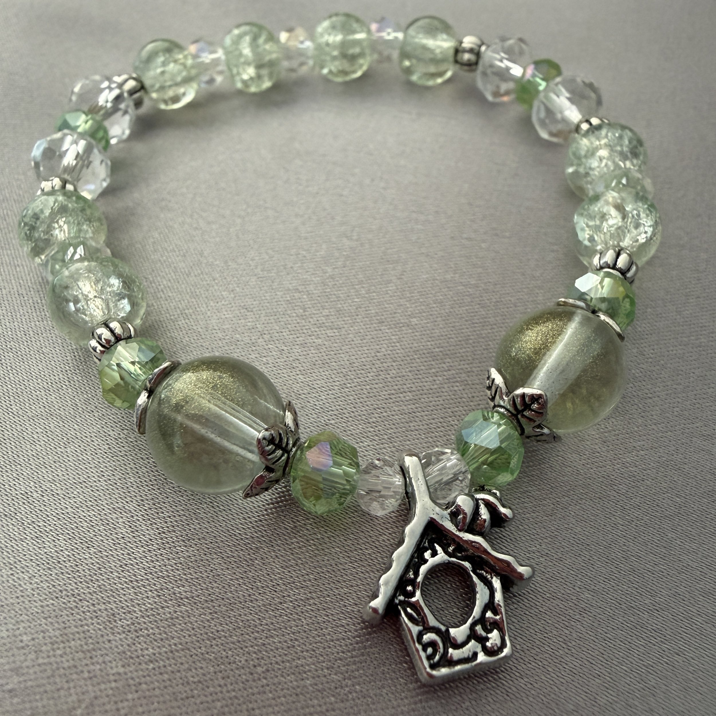 Green and Clear Beaded Bracelet W/Doghouse Charm