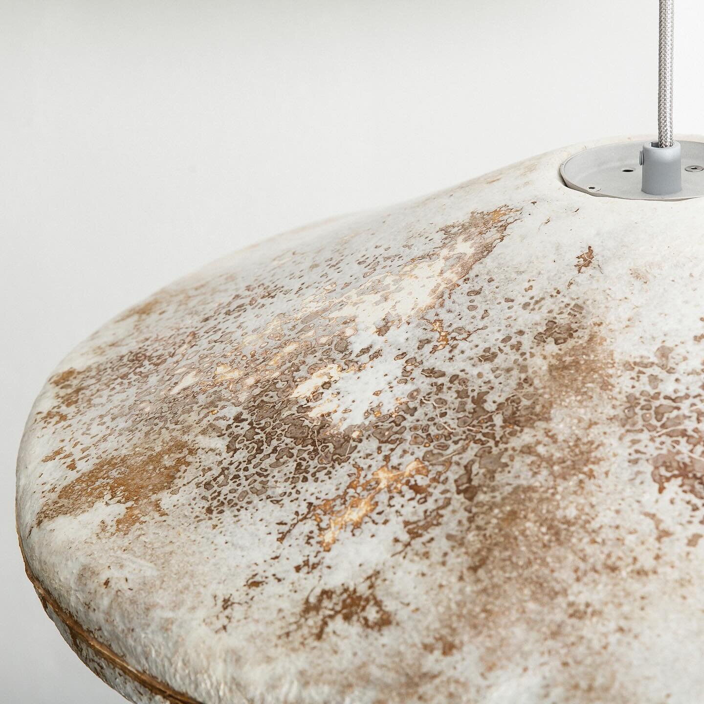 Materials company Myceen developed B Wise, a series of pendant lampshades made from mycelium fibers. To form the bell-shaped shades, mycelium substrate is mixed with timber and agricultural industry waste and poured into a mold to grow under controll