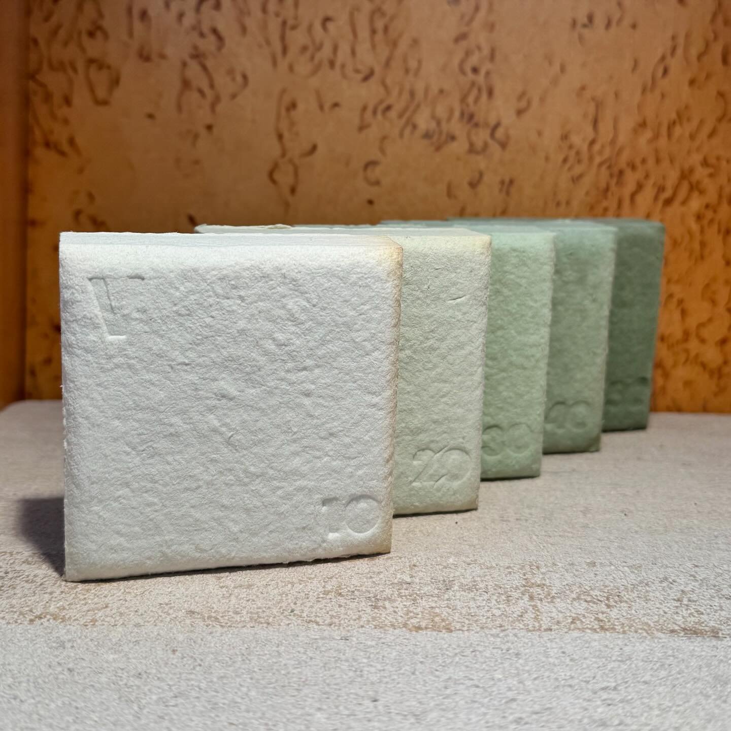 Milleforma&rsquo;s Cotone tiles are crafted from cotton linters and clay, serving as versatile solutions for acoustical insulation and wall coverings. The tiles are dyed with natural pigments without artificial adhesives or mordants, ensuring a susta