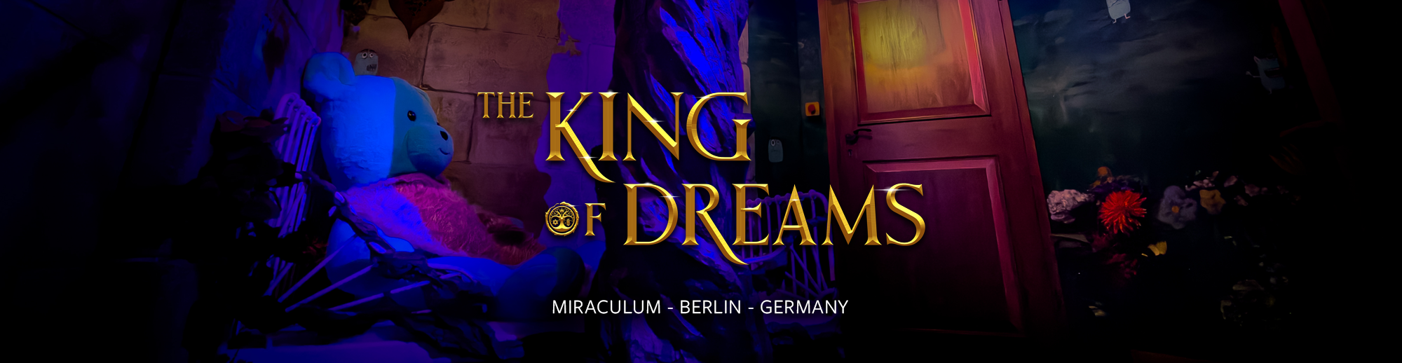 Promotional poster for 'The King of Dreams' at Miraculum in Berlin, Germany, featuring a plush teddy bear and a colorful background with flowers and a red door.