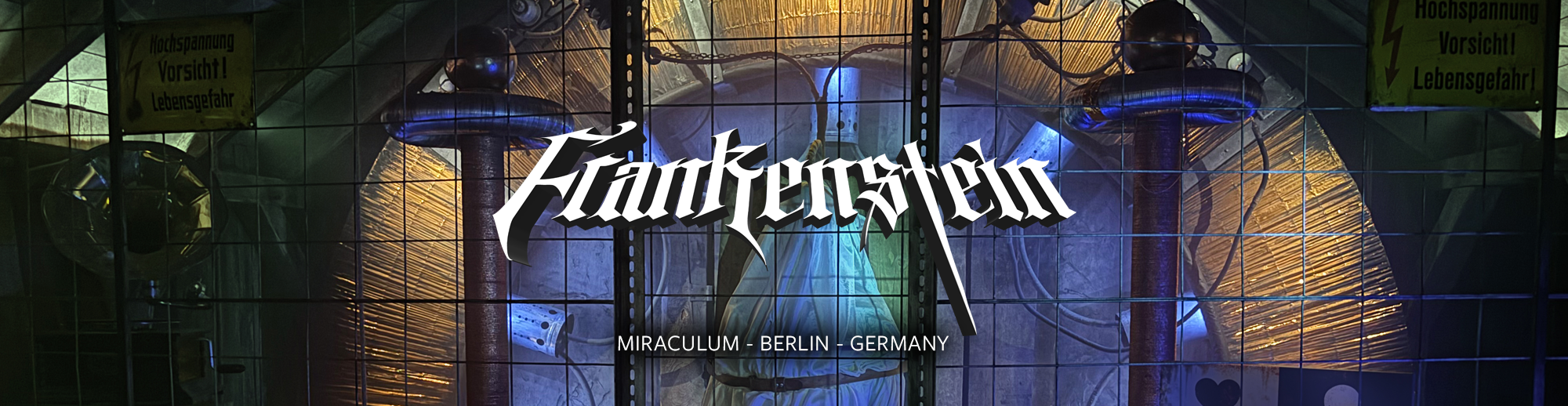 A large sign with the text 'Häfkerstern' in stylized Gothic font, over background images of electrical components and a person in a lab coat, with smaller text reading 'Miraculum - Berlin - Germany'.