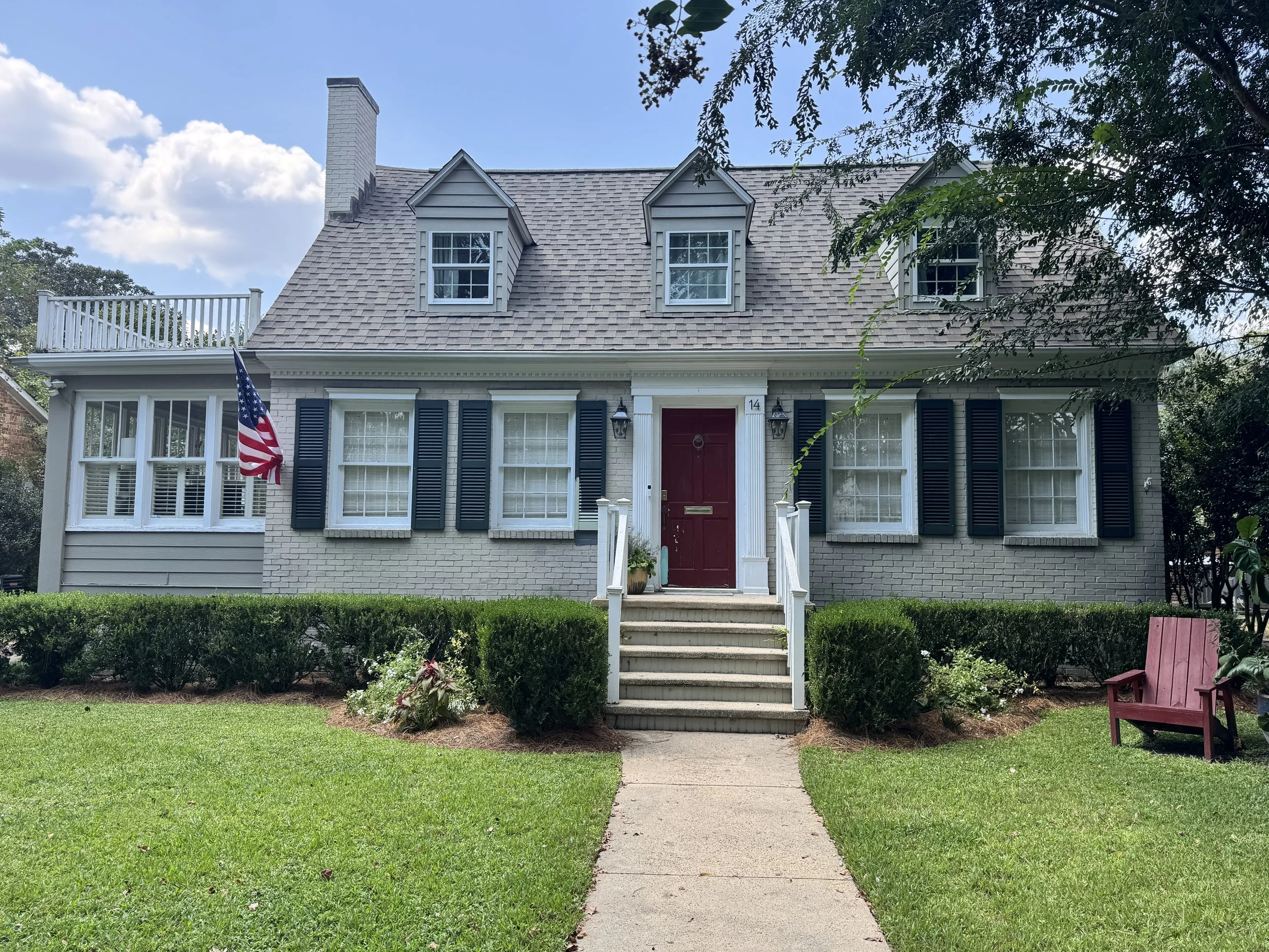 Original exterior before painted brick renovation