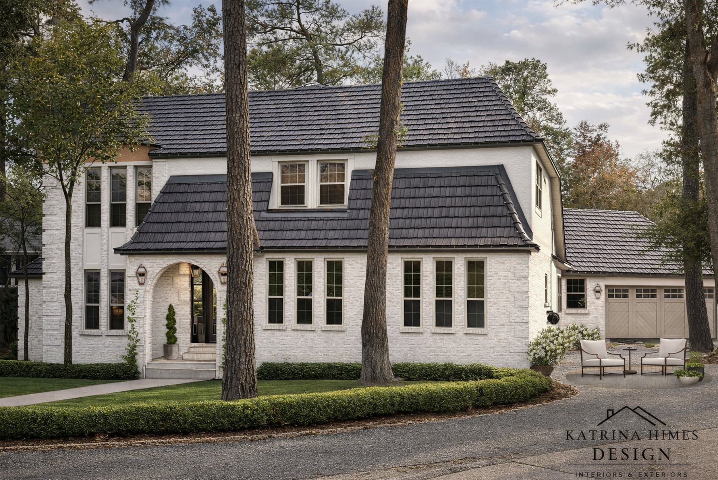 Modern French country exterior design featuring painted white brick and charcoal roof