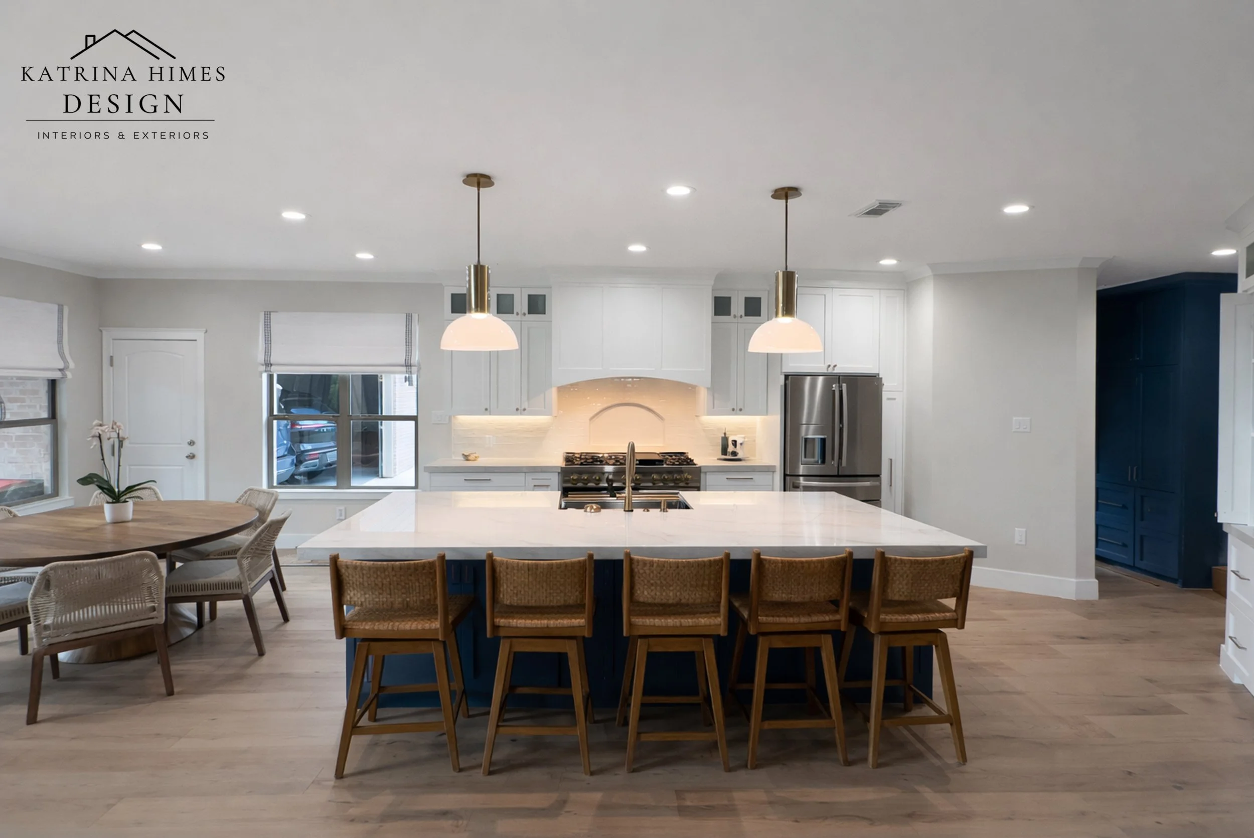 Open Concept Kitchen Design with Custom Cabinetry & Island Seating