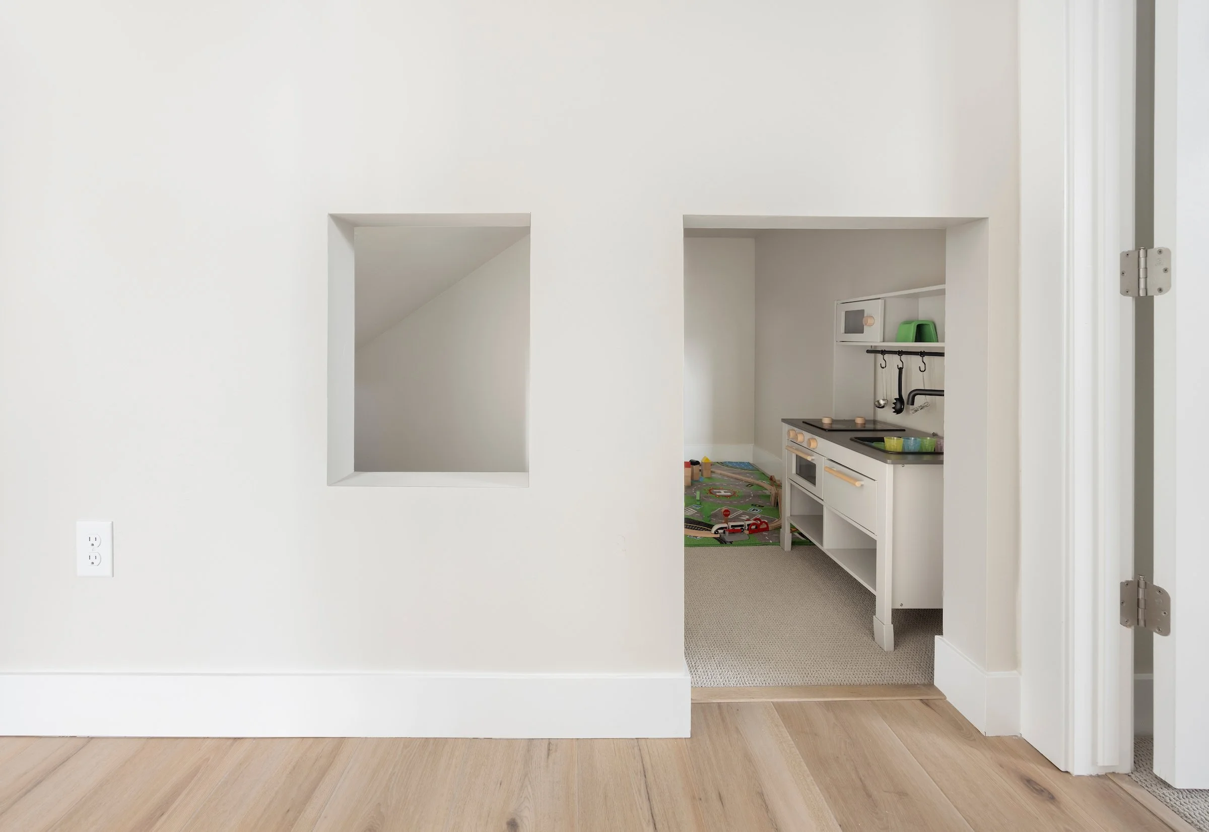 play area underneath the stairs