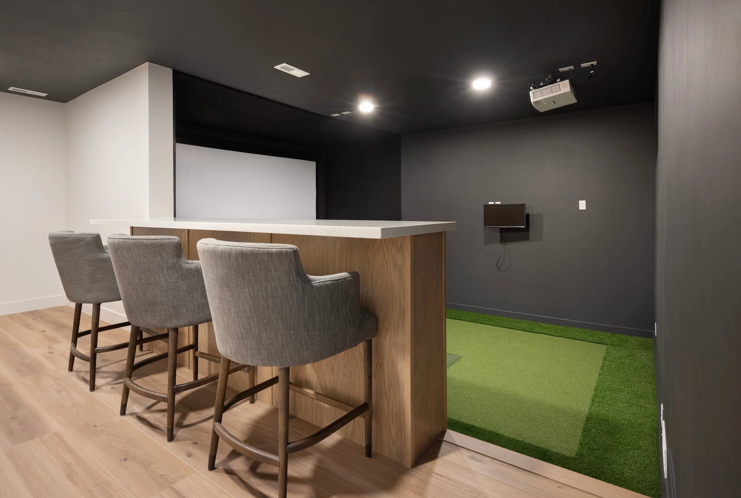 golf simulator (under the garage)