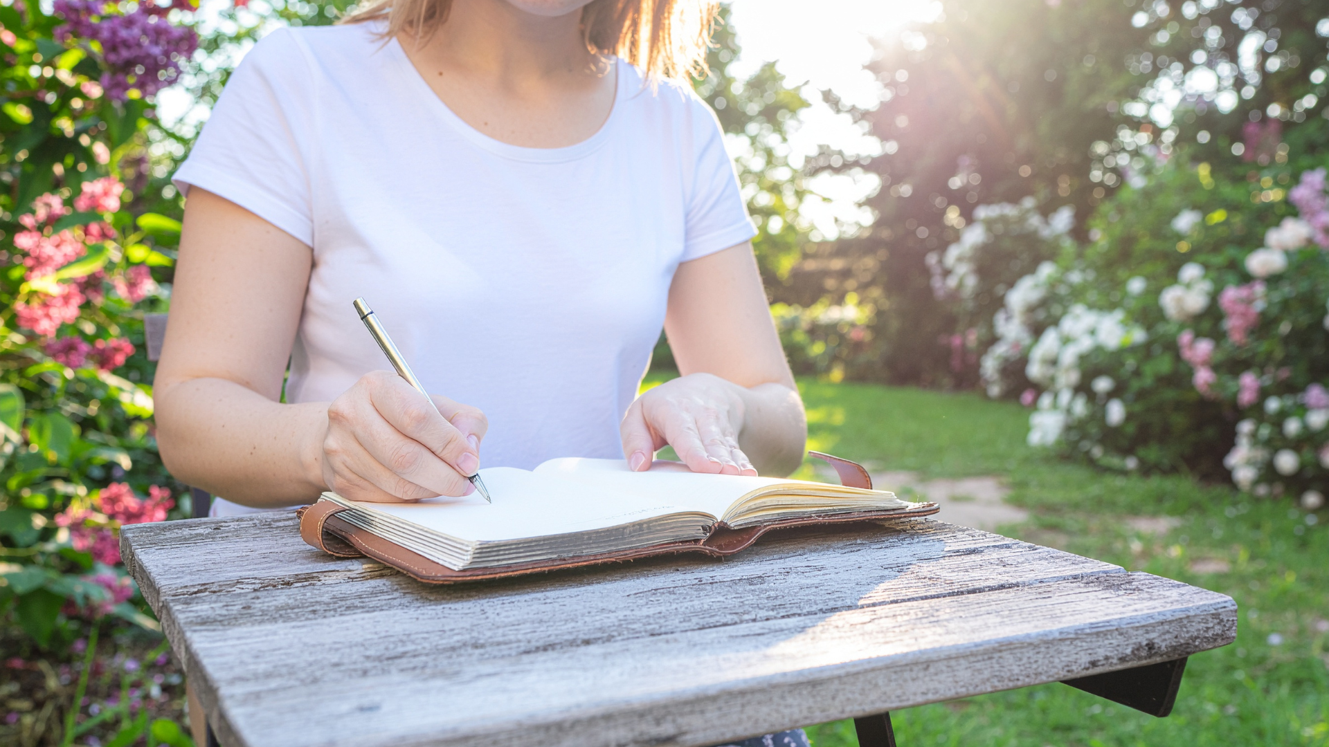 a woman with a win journal