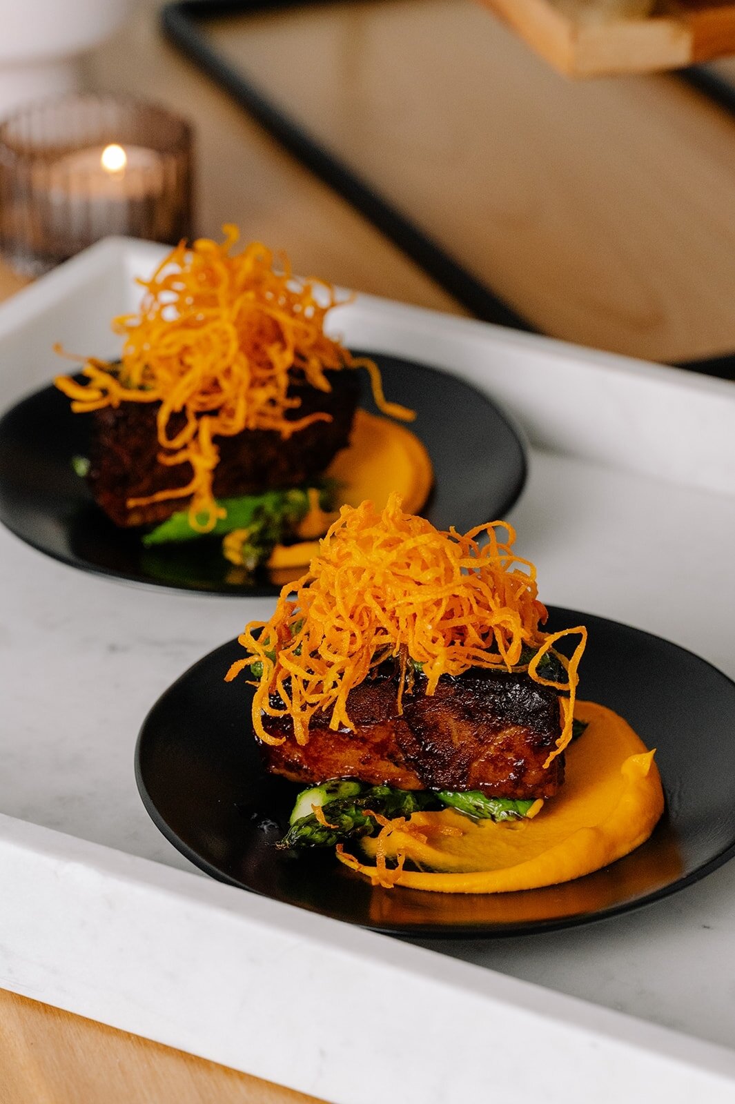 Serving up #smallplate goals, ​​​​​​​​
our Braised Beef Short Rib​​​​​​​​
-carrot fondant, asparagus, harissa, shoestrings ​​​​​​​​
It is oh so good!
