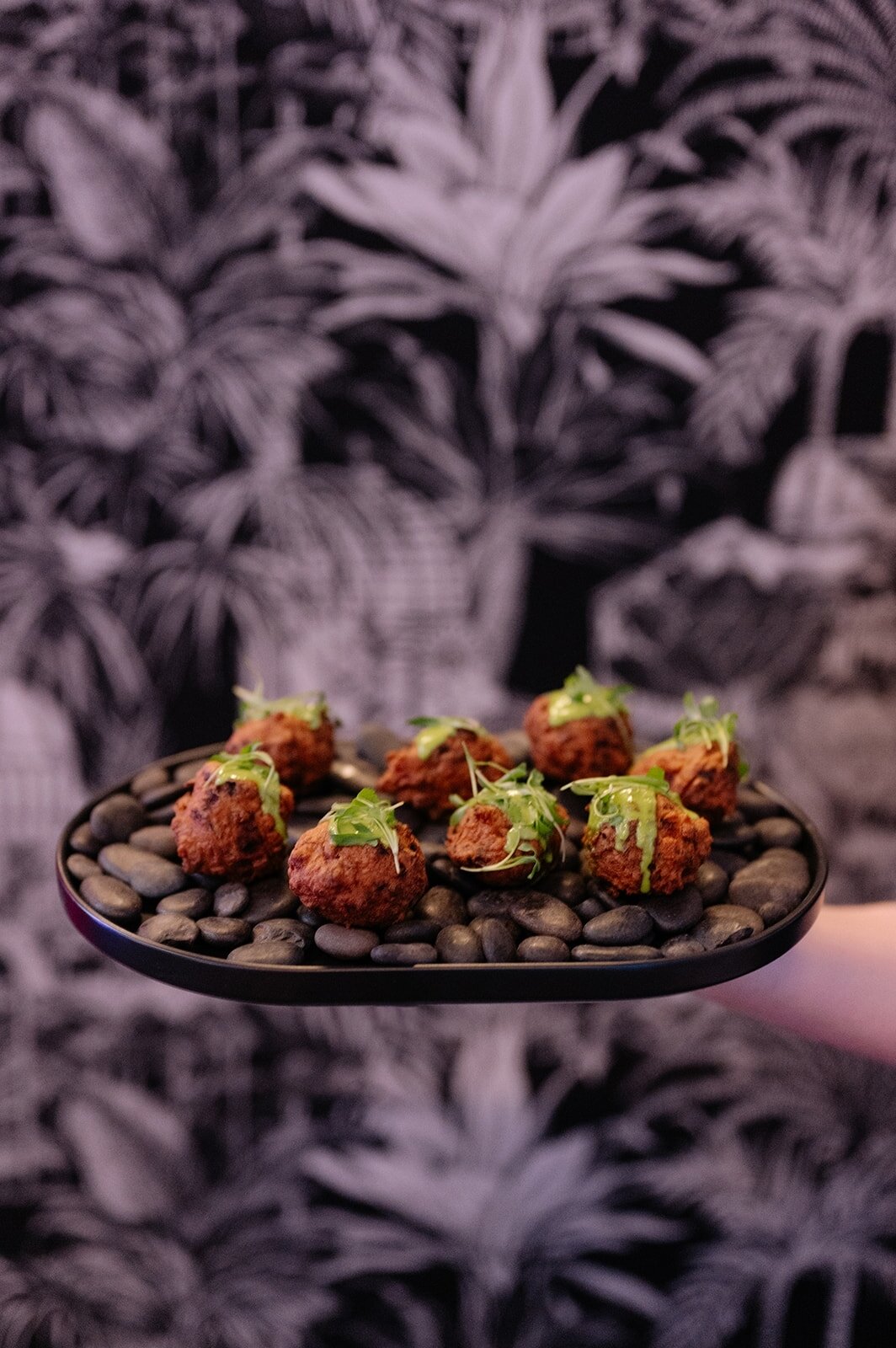 This divine canape made its premiere at our recent &quot;El Borde&quot; event - the Crispy Conch Fritter.
-Caribbean conch fritter with salsa verde &amp; micro cilantro.
It is truly the most perfect bite. 
..
Whether you want to add this incredible n