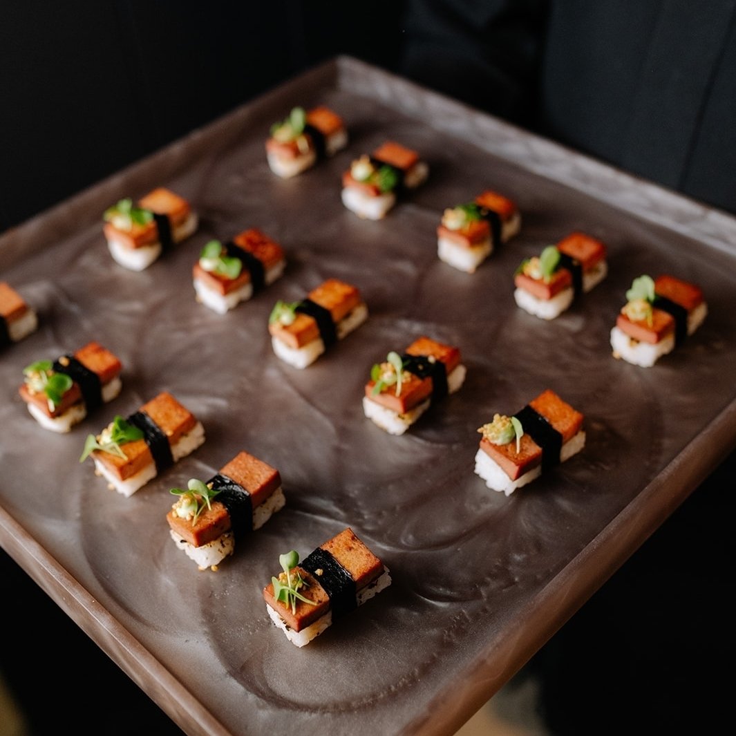 ✨ One of our most popular vegan canap&eacute;s ✨​​​​​​​​
Our Musubi Canap&eacute;s &mdash; a  fusion of flavor and elegance:​​​​​​​​
🍙 Marinated tofu​​​​​​​​
🍚 Seasoned Japanese rice​​​​​​​​
🌿 Furikake​​​​​​​​
🧡 Vegan masago pearls​​​​​​​​
​​​​​​