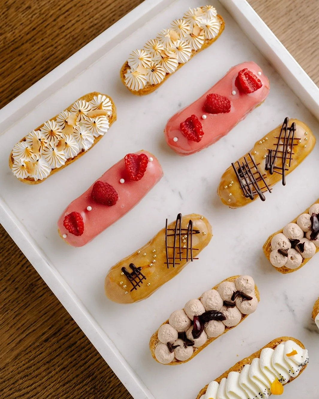 Edge &Eacute;clairs
Because life&rsquo;s too short for boring desserts.

Exquisitely decorated and crafted with love, these beauties come in six swoon-worthy flavours&mdash;or customize your own:

Cherry Chocolate &ndash; layers of cherry pastry crea