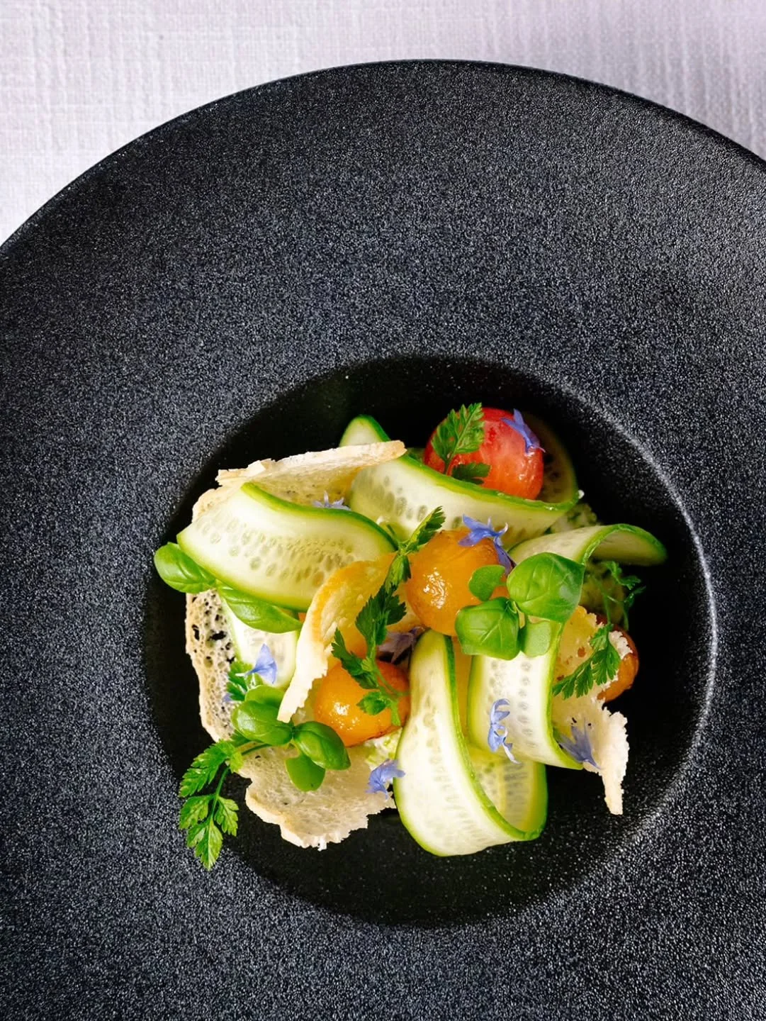 Stracciatella dreams 💭✨
Creamy, herby, and just the right amount of fancy &mdash; our Stracciatella with Persian cucumber, blistered tomato, focaccia tuile, borage flowers, basil oil &amp; herbs is what summer-on-a-plate tastes like 🌿🍅💫

A little