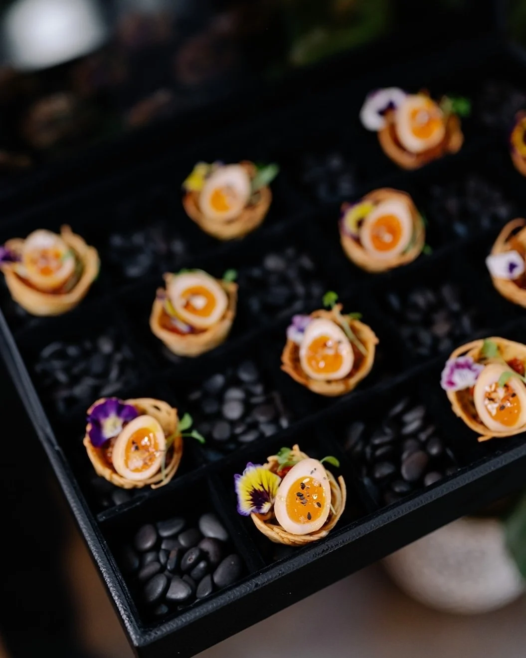 ✨Ramen dreams, reimagined.✨​​​​​​​​
​​​​​​​​
Our Quail&rsquo;s Nest Canap&eacute; is a playful nod to your late-night noodle obsession &mdash; sake &amp; soy&ndash;stained egg, crispy noodles, braised Asian vegetables, and edible florals. 🌸🍜​​​​​​​