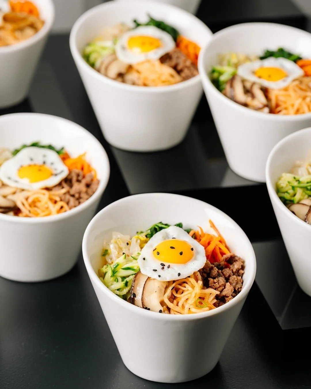 Our Bibimbap Bar is bringing all the flavour and fun to the table! 🌈🍚​​​​​​​​
​​​​​​​​
Choose your base and top it with:​​​​​​​​
​​​​​​​​
🥩 Beef Bulgogi​​​​​​​​
with quail egg, kimchi, saut&eacute;ed vegetables, shiitake mushrooms &amp; bean sprou