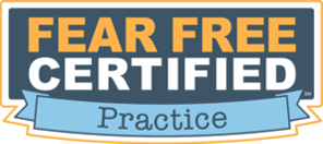 Badge with orange, black, white, and blue colors that reads 'Fear Free Certified Practice'.
