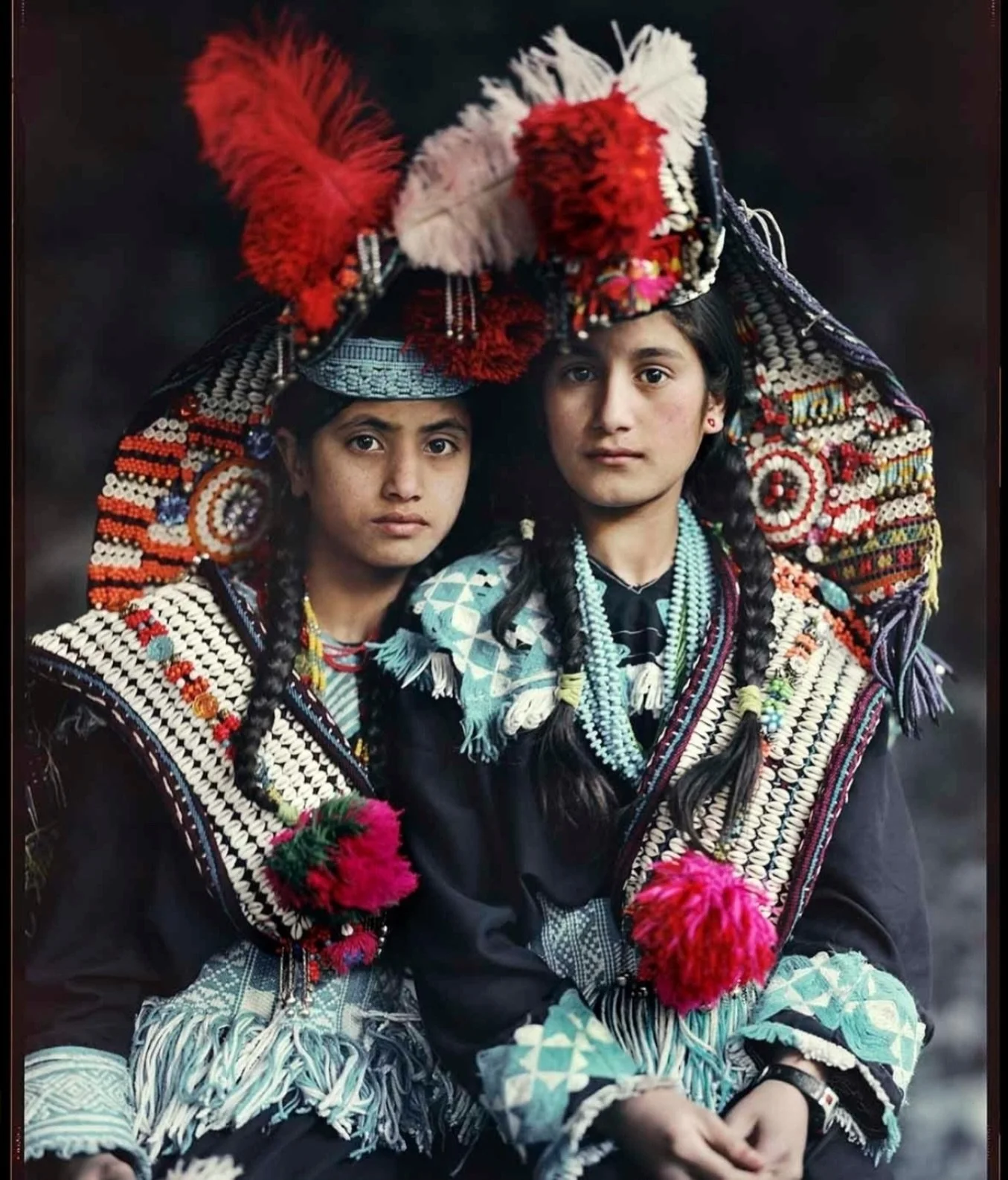 In the Rumbur Valley in northern Pakistan, live the Kalash, one of the world&rsquo;s smallest and most ancient indigenous communities.
These two girls wear the Kupas, the elaborate ceremonial headdress that Kalash women and girls have adorned for gen