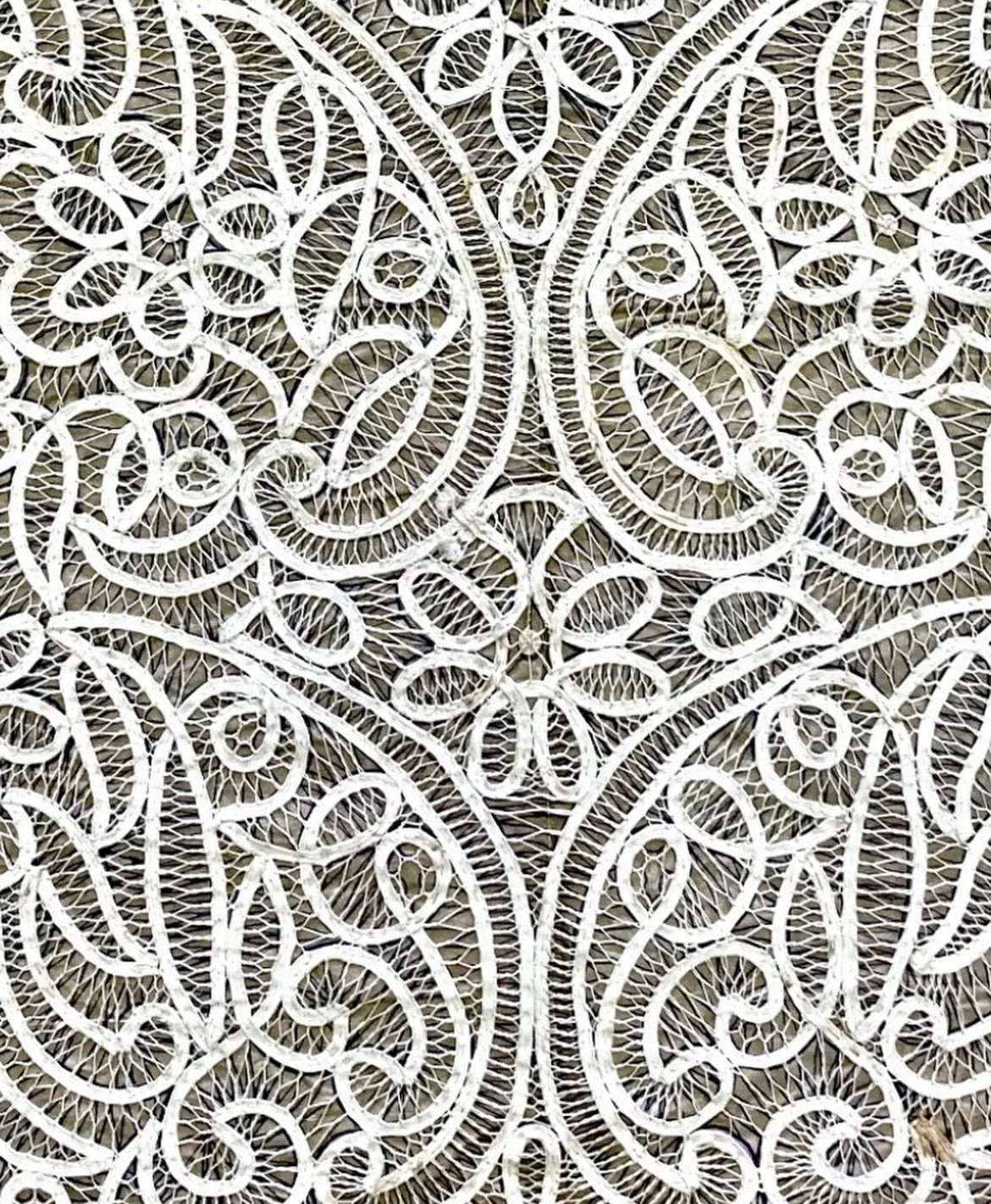 This beautiful vintage tapework is the back panel to a garment. I found it still stitched to the original paper pattern - a mystery as to why it was never completed. 

#tapework #vintagetextile #handemboidery #antiqueembroidery #sophieroet